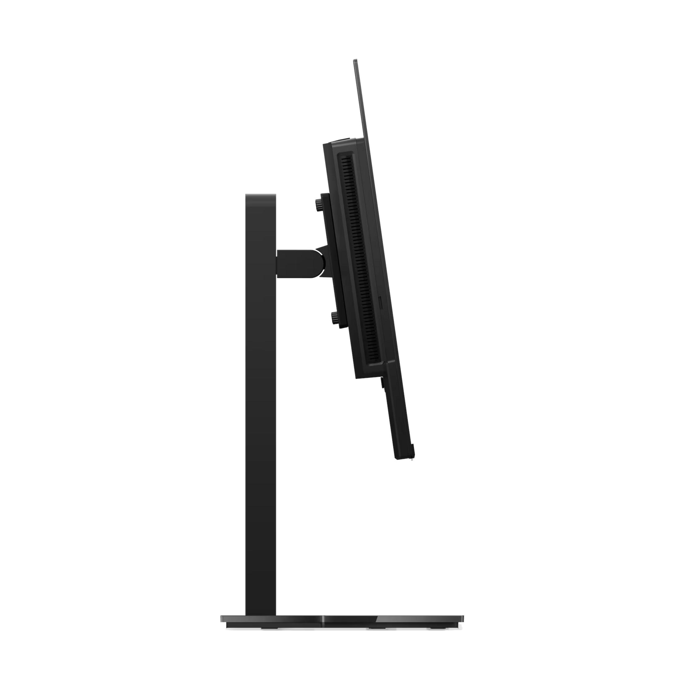 Un monitor di computer nero su un supporto, visto di lato.