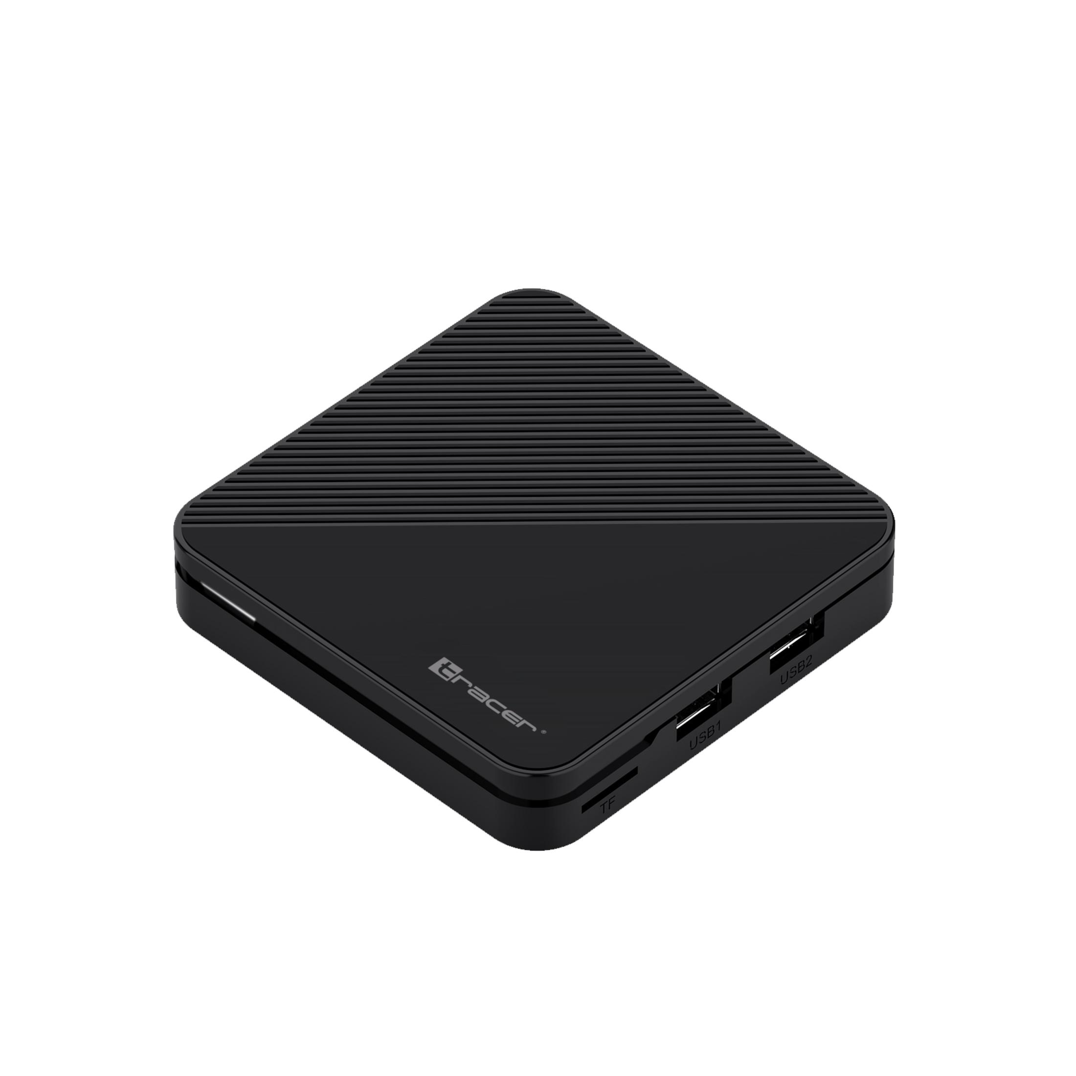 Dispositivo nero a forma di diamante con coperchio scanalato, due porte USB e uno slot per schede TF.