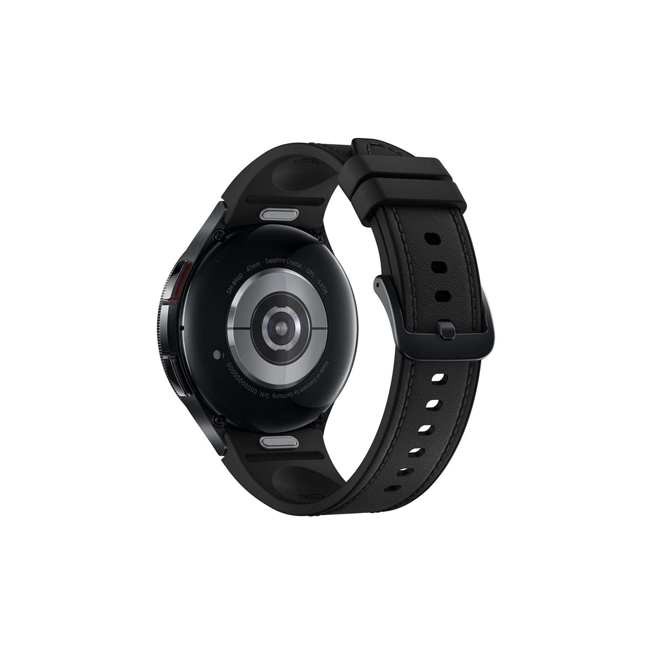 Reloj inteligente negro con correa de cuero, parte trasera con sensores y detalles.