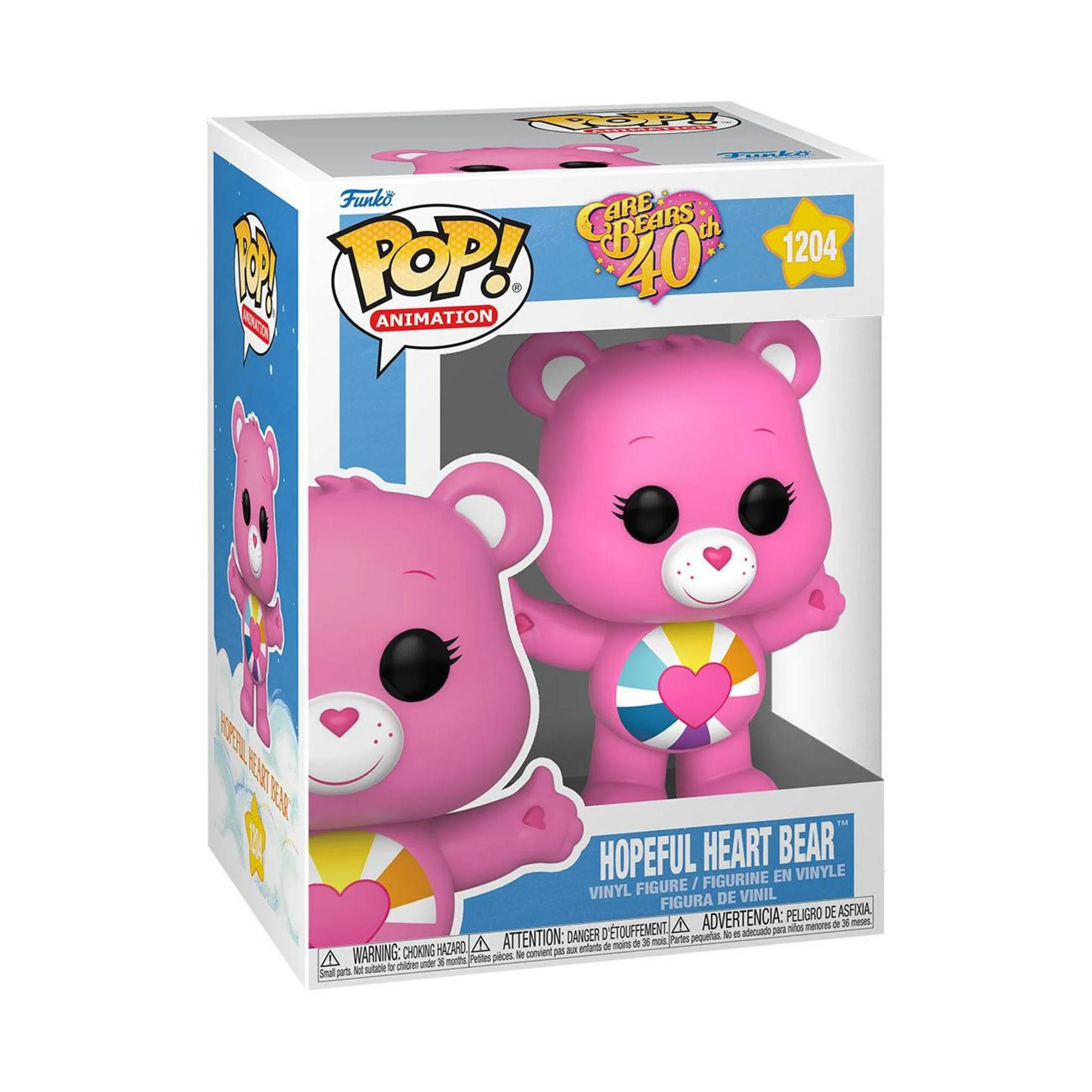 Eine rosa Funko Pop! Figur von Hopeful Heart Bear in einer Box.