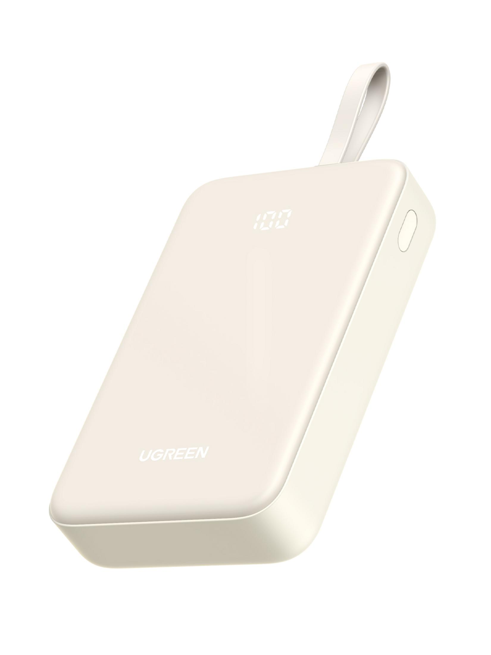 Un power bank UGREEN color crema con display digitale 100 e un anello.