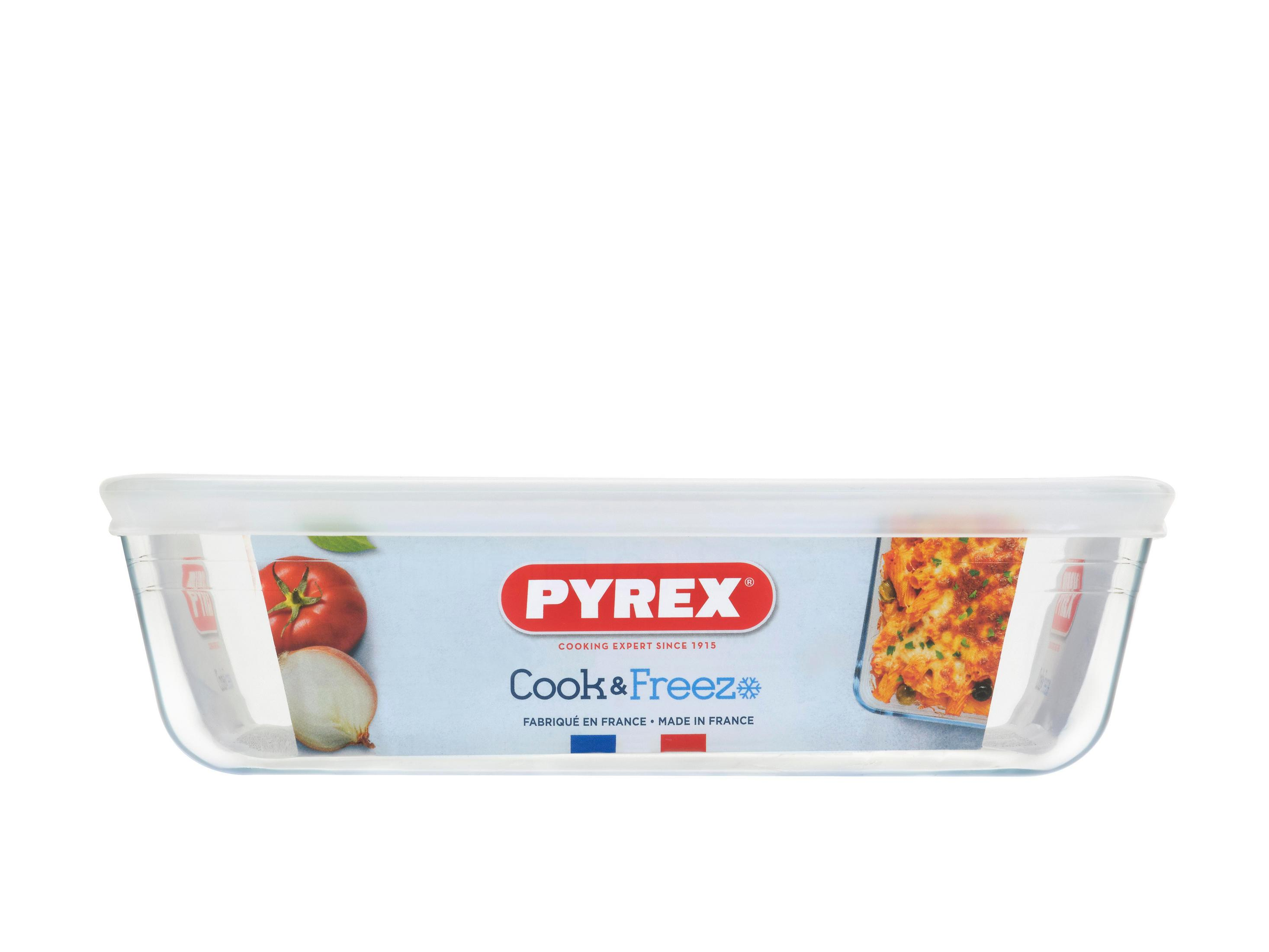 Piatto Pyrex con coperchio, mostra un pasto e ingredienti.