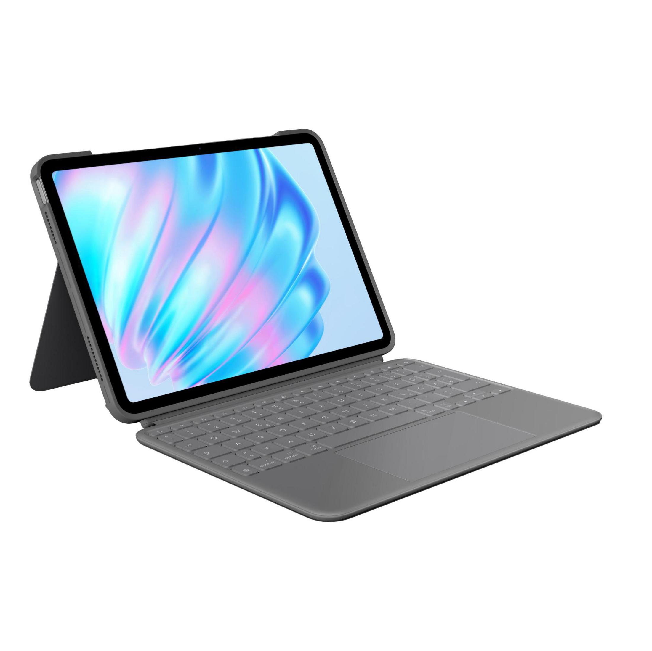 Tableta gris con funda de teclado y fondo colorido en pantalla.