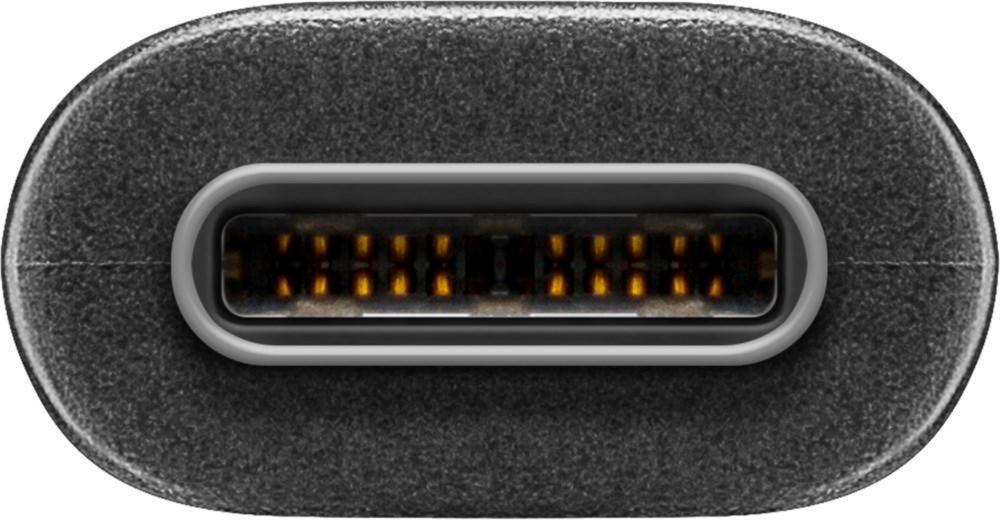 Primer plano de un conector USB-C que muestra contactos dorados visibles.