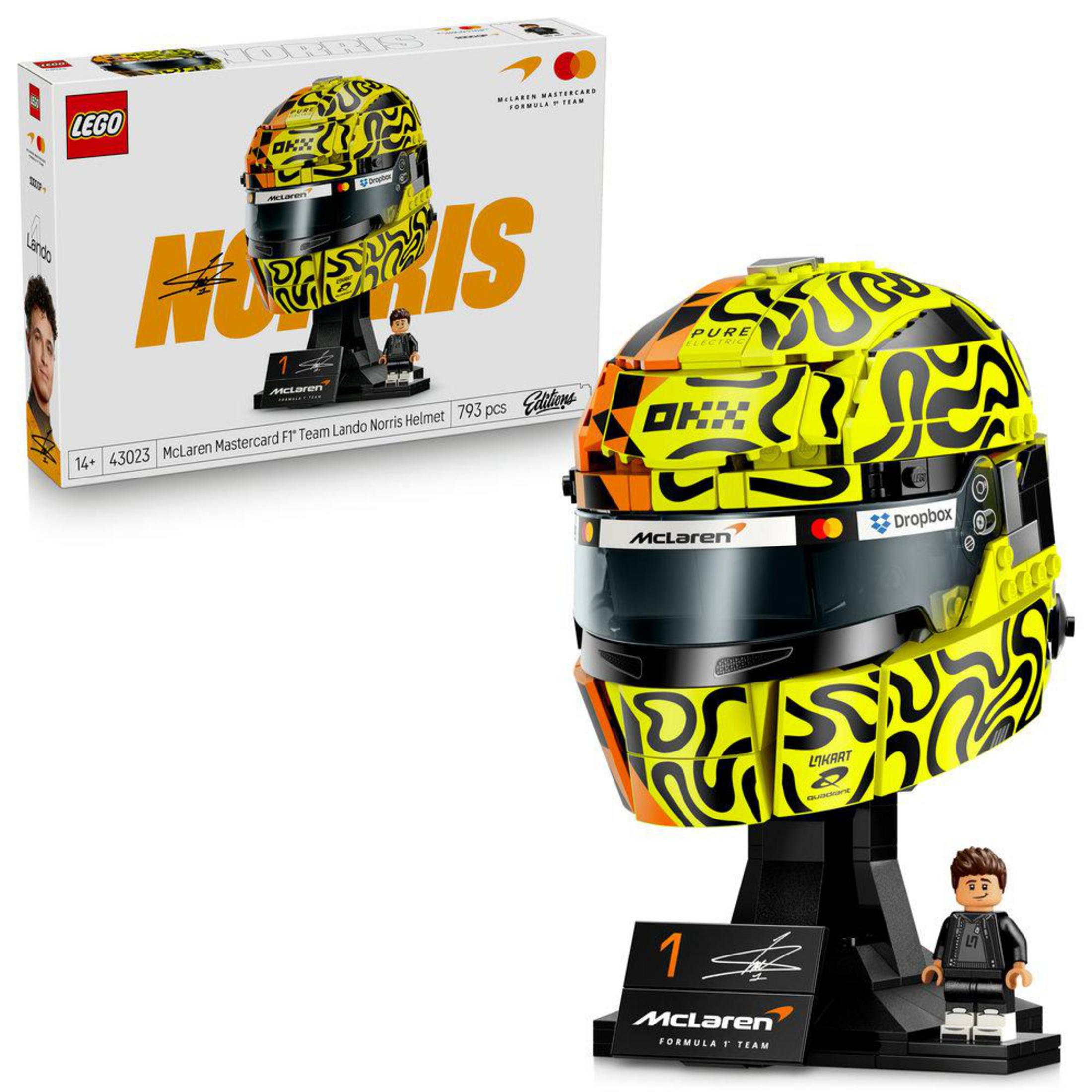 Kutu ve minifigürlü bir McLaren F1 Lando Norris kaskının LEGO modeli.