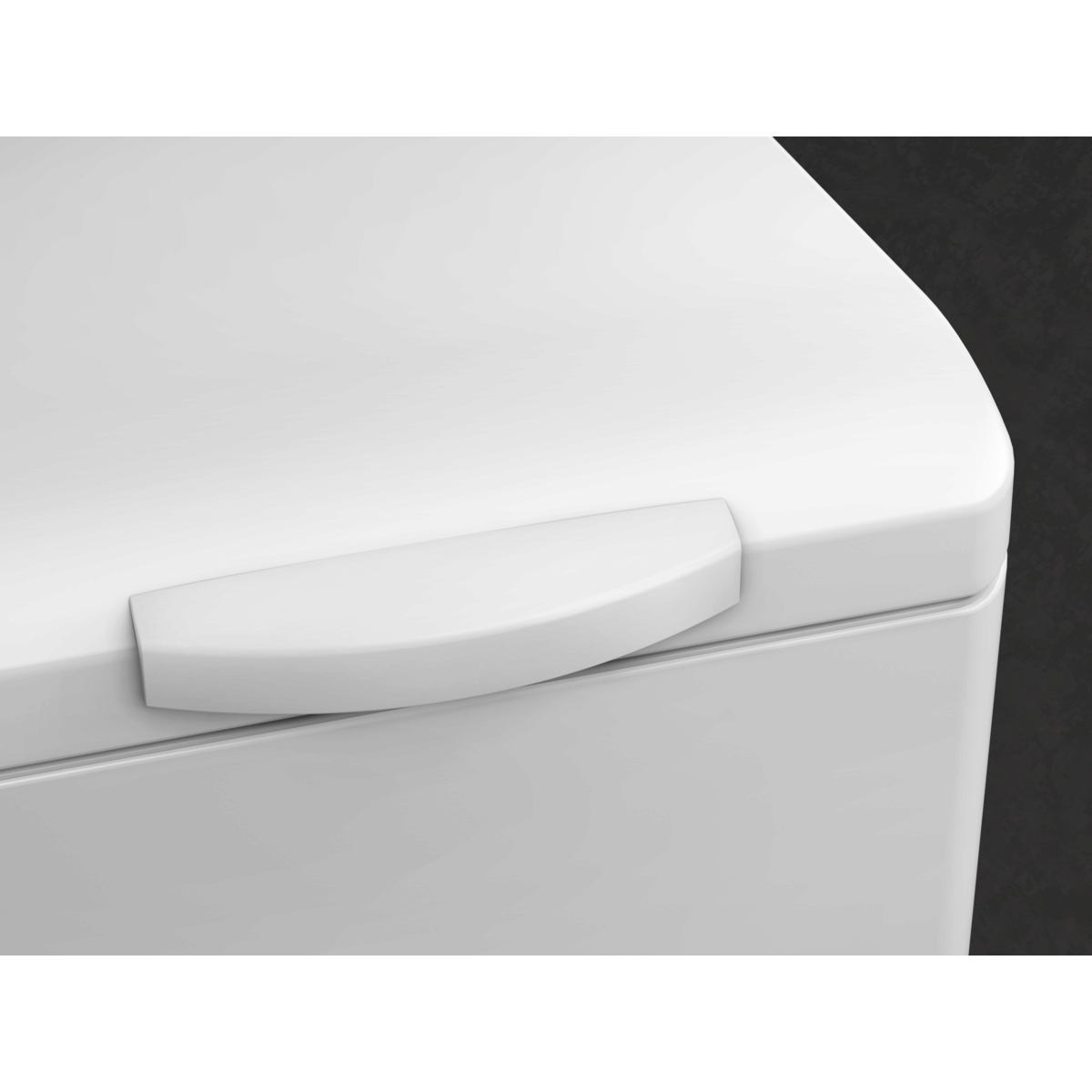 Un asa blanca sobre una caja blanca con fondo oscuro.