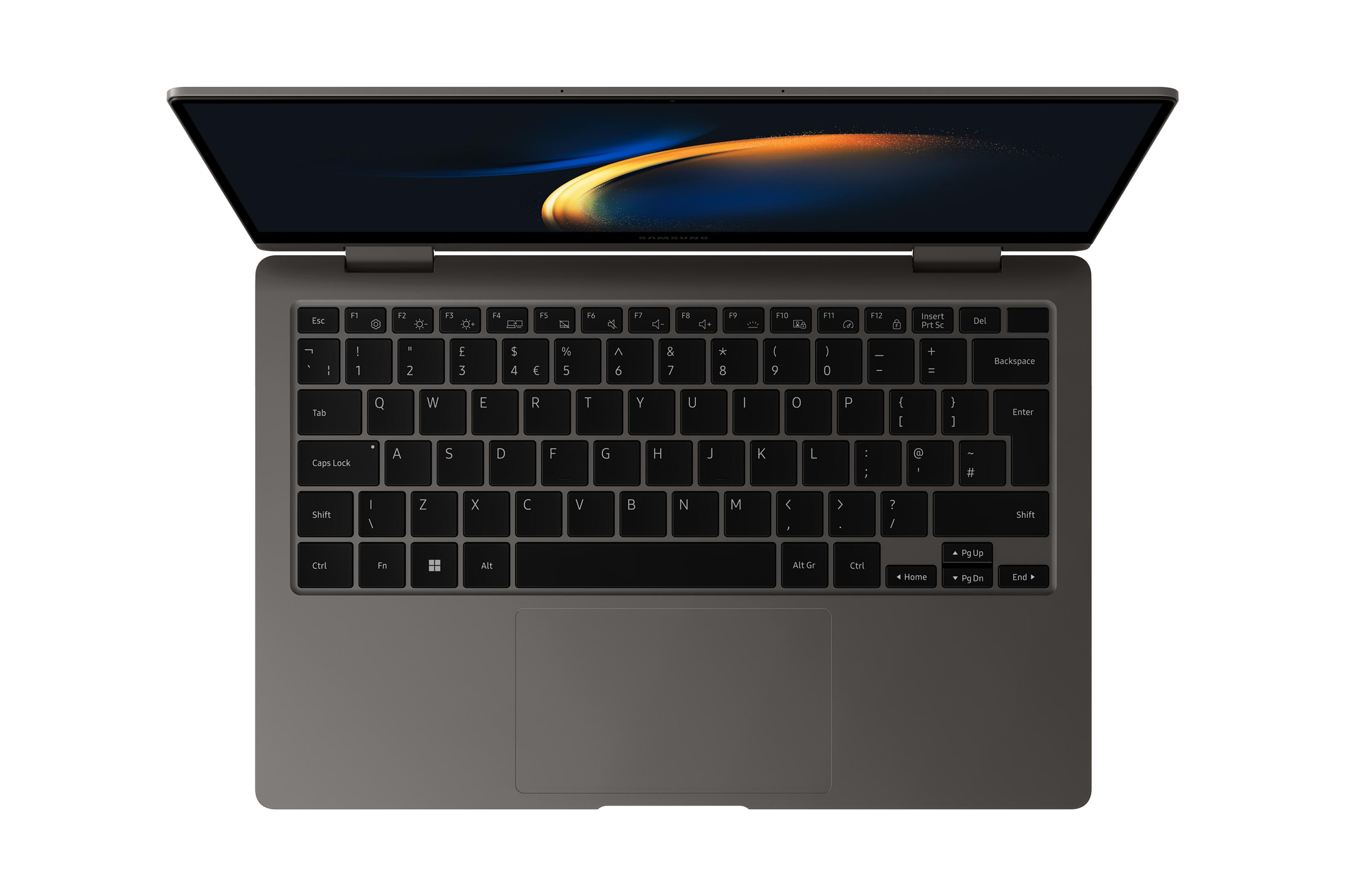 Un laptop Samsung grigio con lo schermo aperto, che mostra la tastiera.