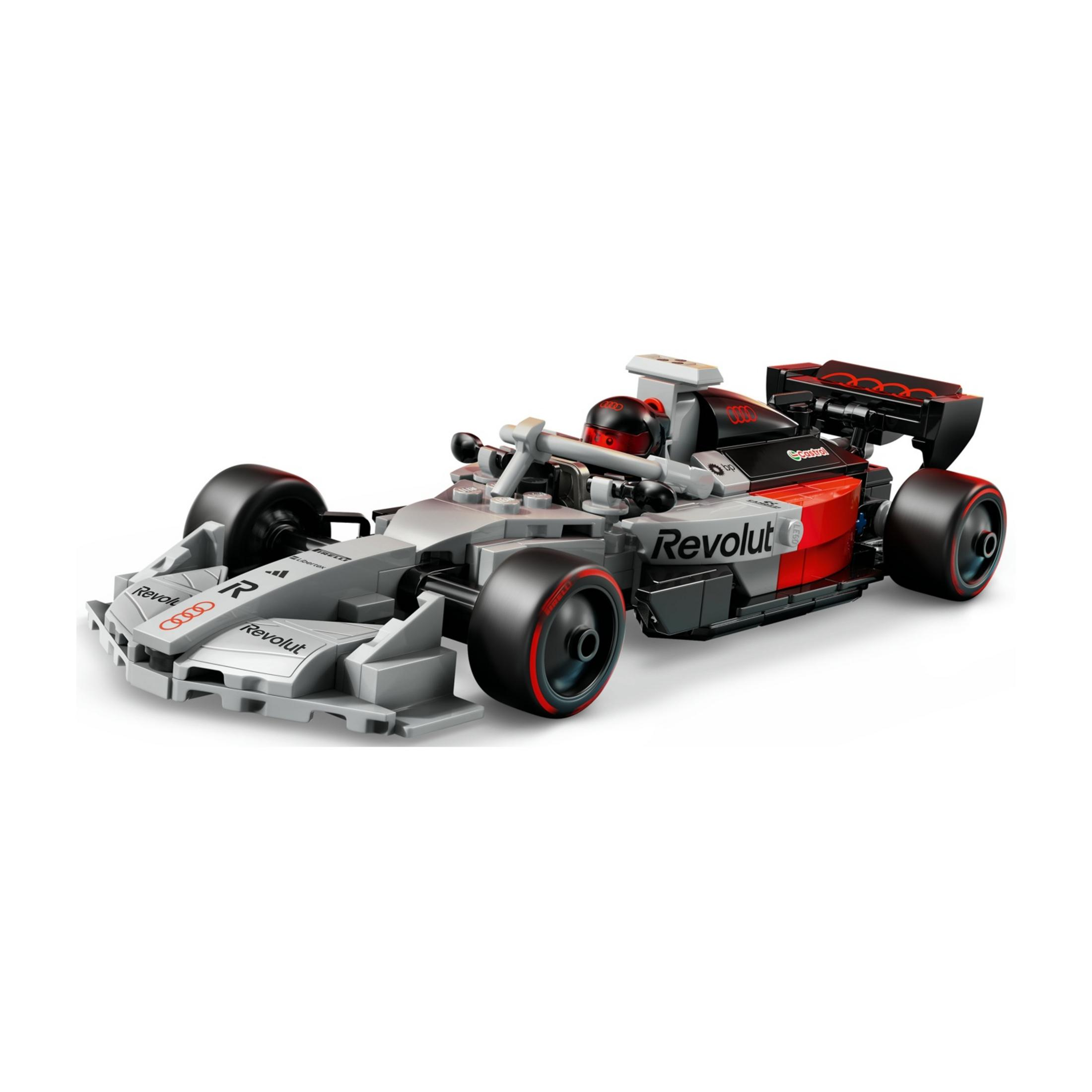 Siyah sürücülü ve kanatlı gri ve kırmızı Lego Formula 1 aracı.