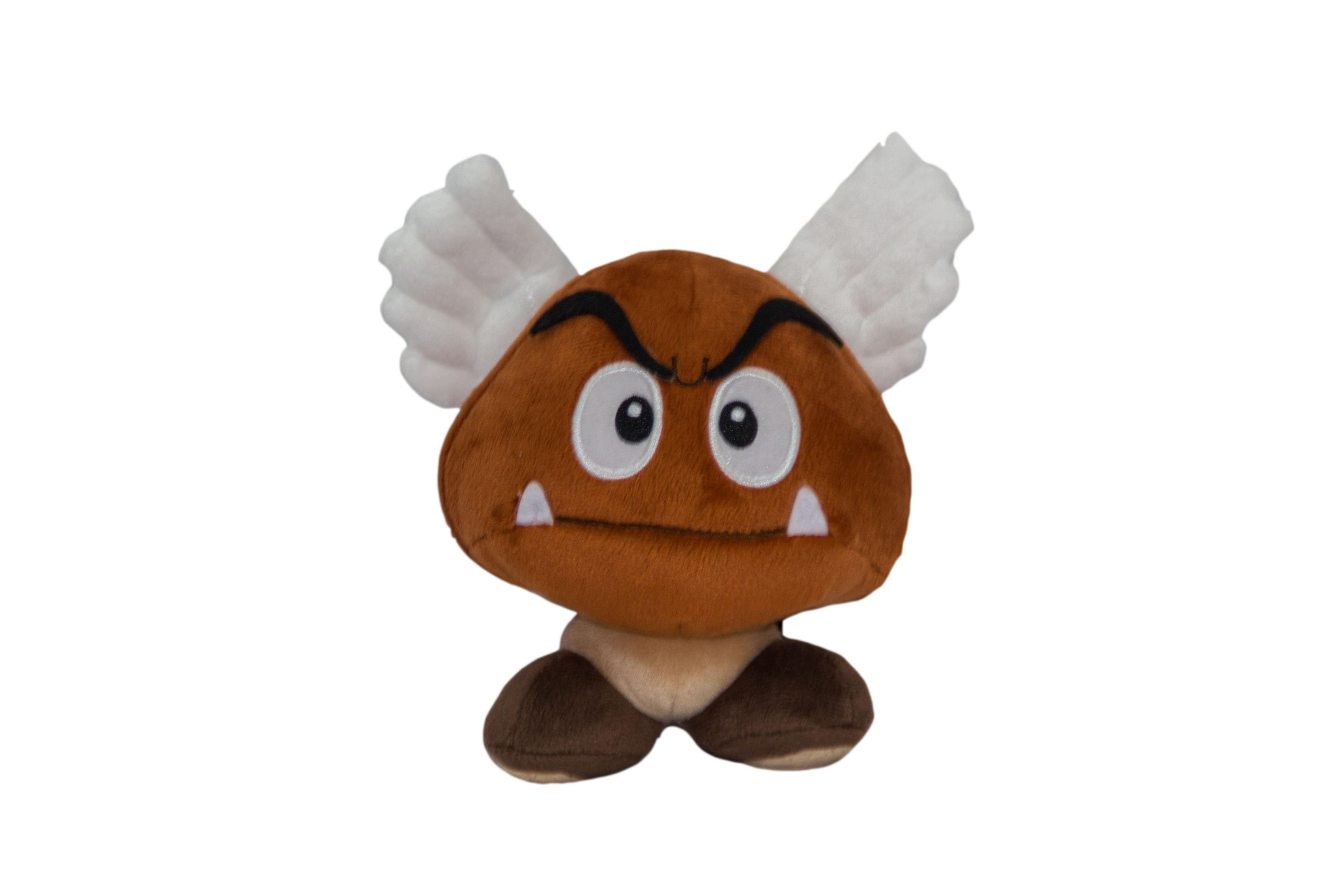 Peluche marrone con ali bianche, occhi grandi e bocca.