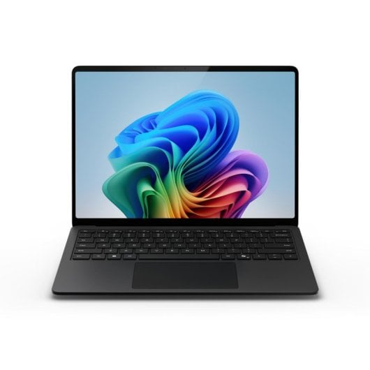 Czarny laptop wyświetlający kolorową, abstrakcyjną tapetę na ekranie.