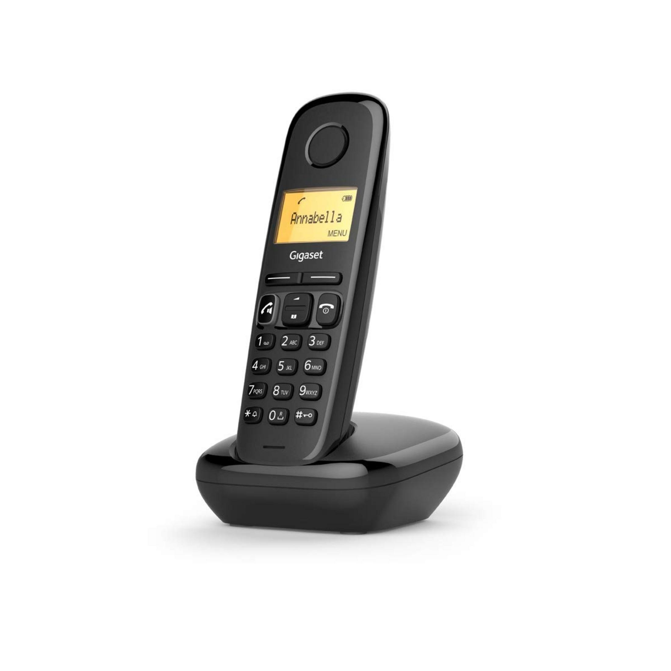 Un telefono cordless Gigaset nero con schermo giallo che mostra 'Annabella'.