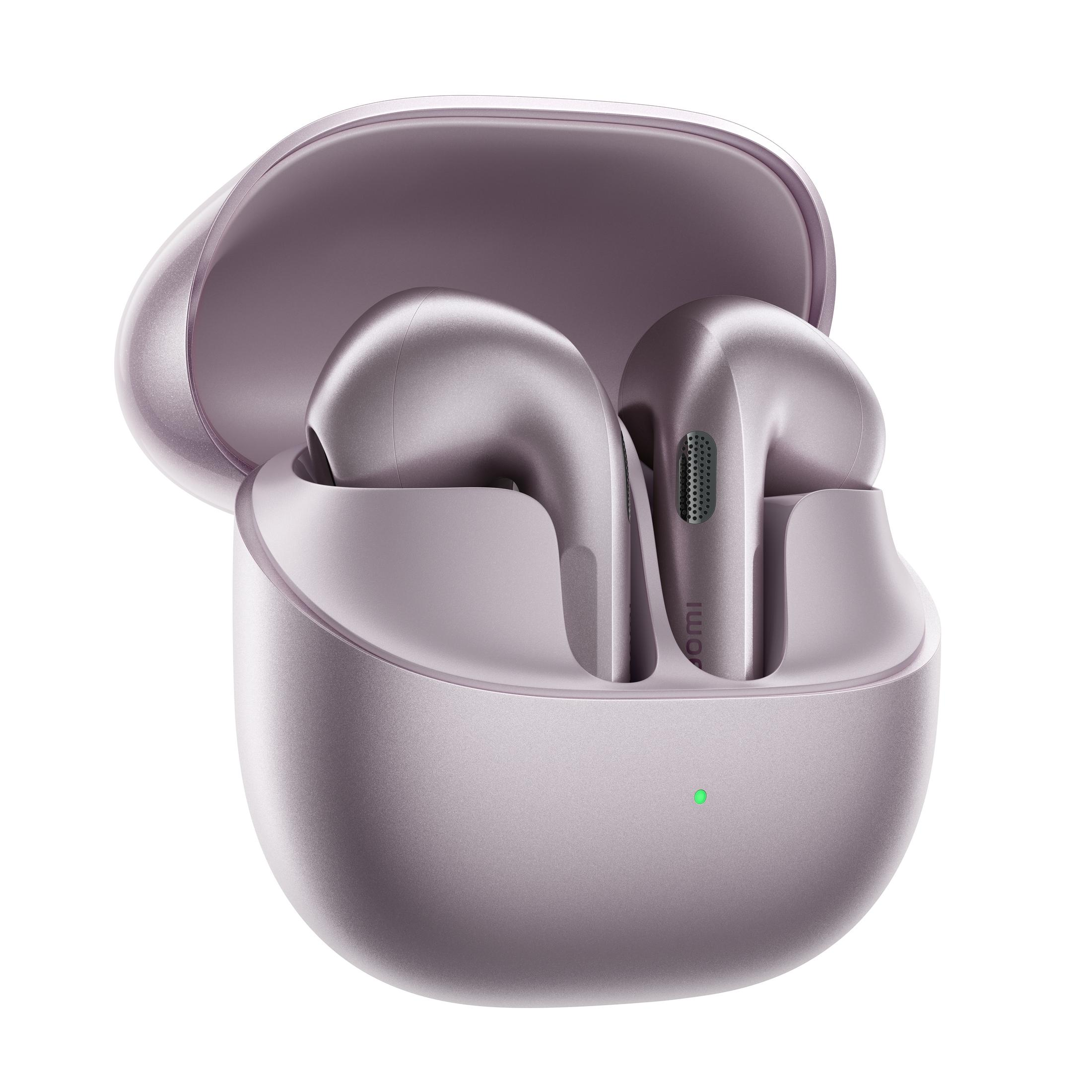 Auricolari wireless viola nella loro custodia di ricarica aperta, con spia verde.