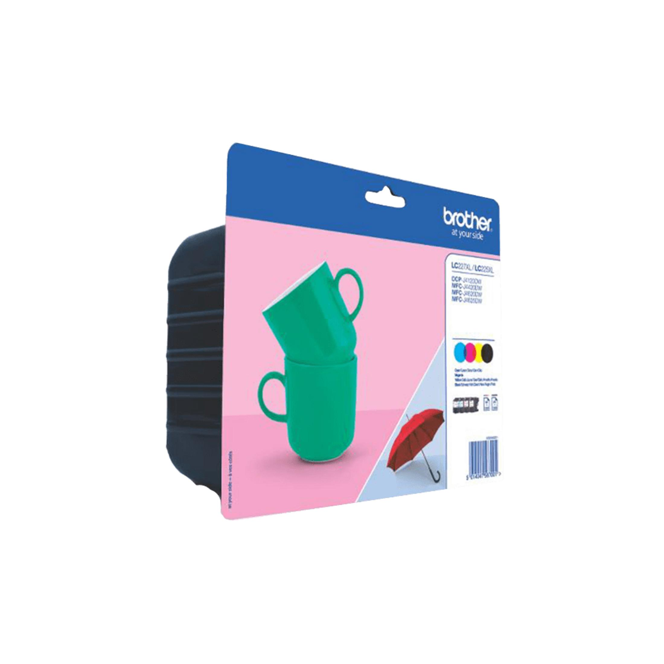 Verpakking met twee groene mokken en een rode paraplu op roze achtergrond.