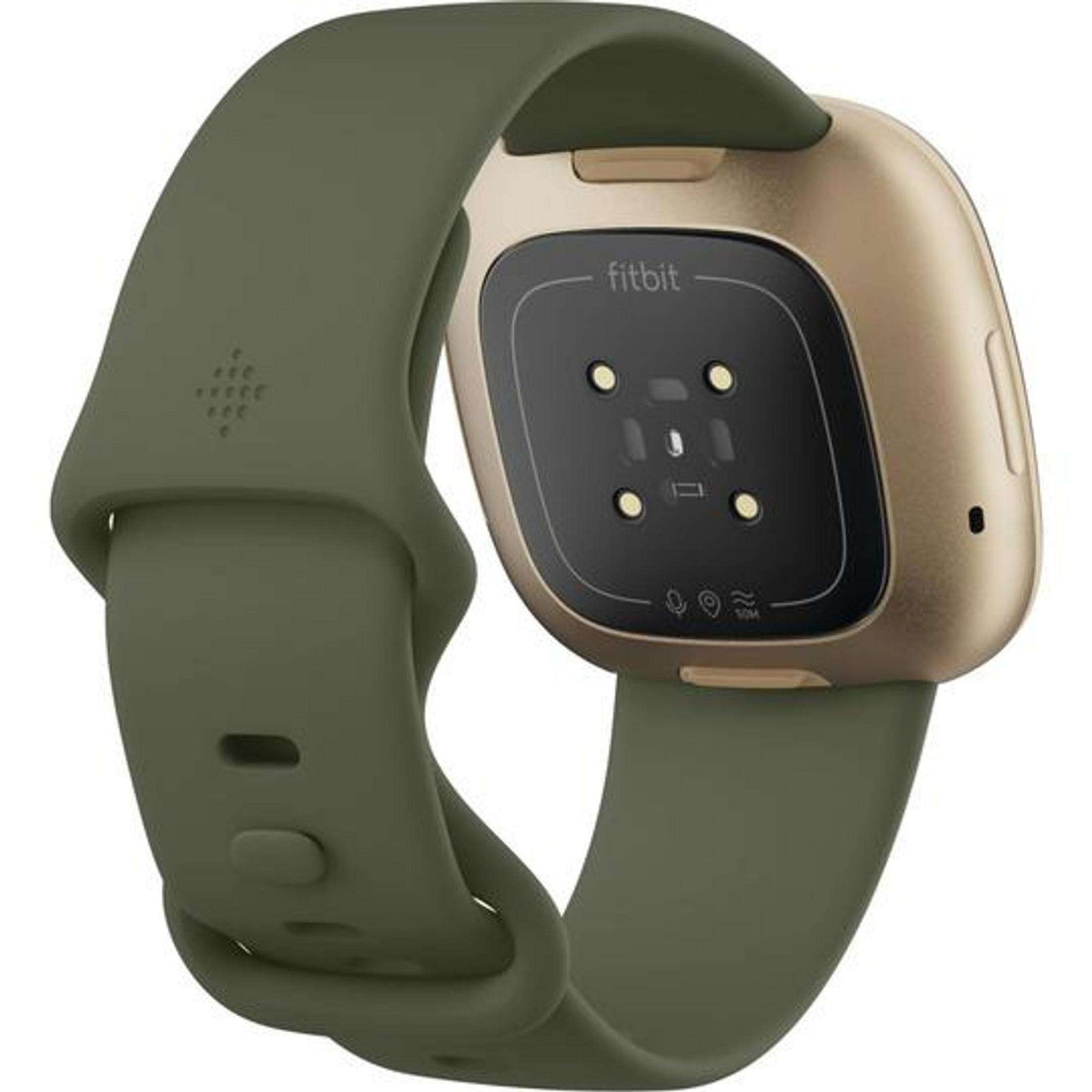 Eine goldene Fitbit-Smartwatch mit einem dunkelgrünen Armband auf weißem Hintergrund.