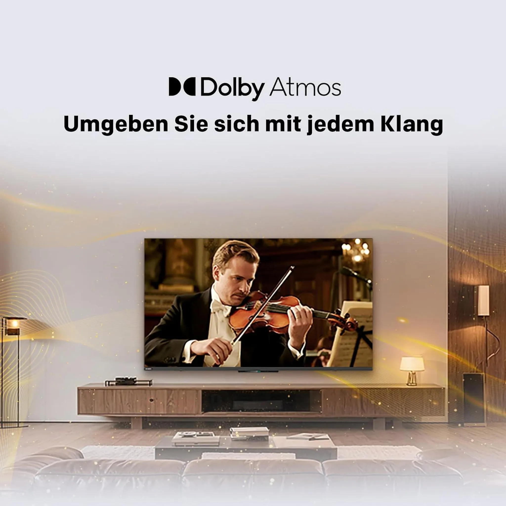 Uomo suona violino su TV con logo Dolby Atmos.