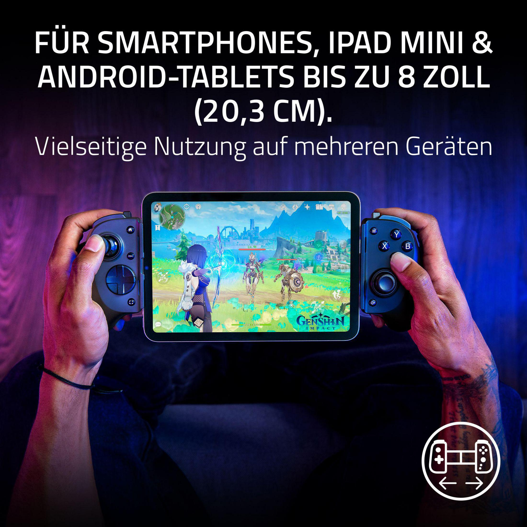 Persona che tiene tablet con controller di gioco, gioca a Genshin Impact.