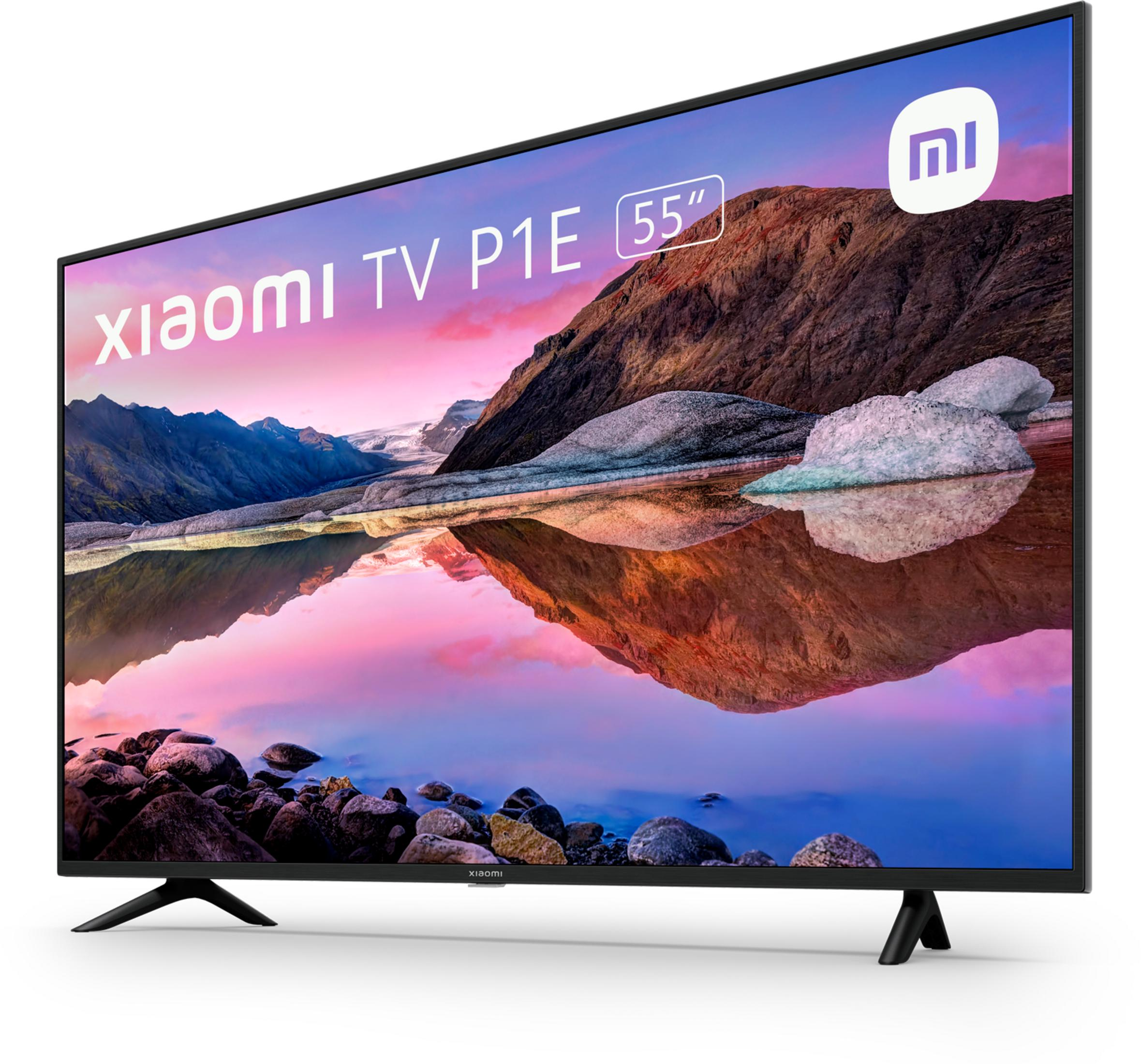 Un televisor Xiaomi de 55" que muestra una escena de montaña con patas azules.