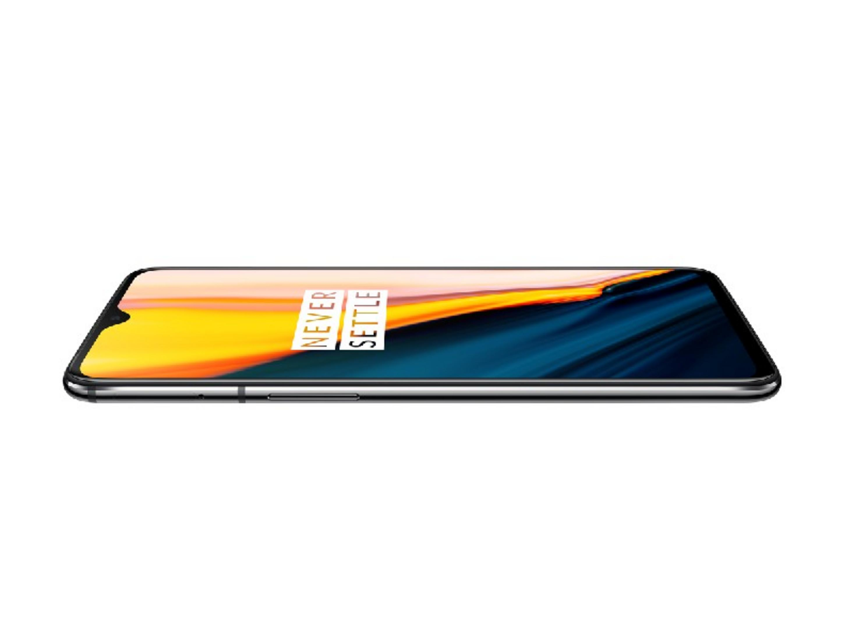 Ein Smartphone mit einem stilisierten Hintergrund in Gelb-, Orange- und Blautönen.