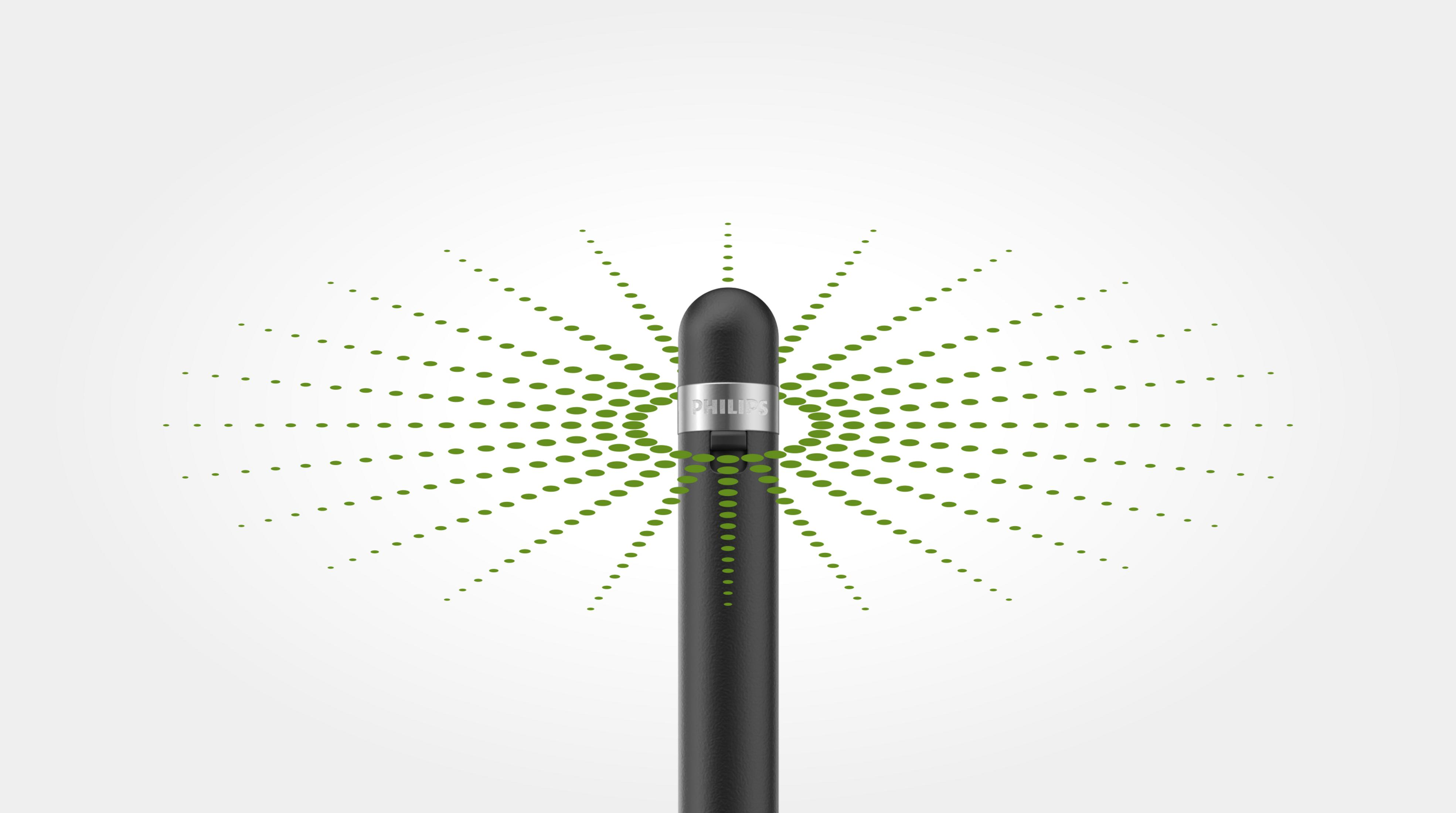 Un tool per la cura personale Philips nero con punti verdi che si irradiano verso l'esterno su sfondo bianco.