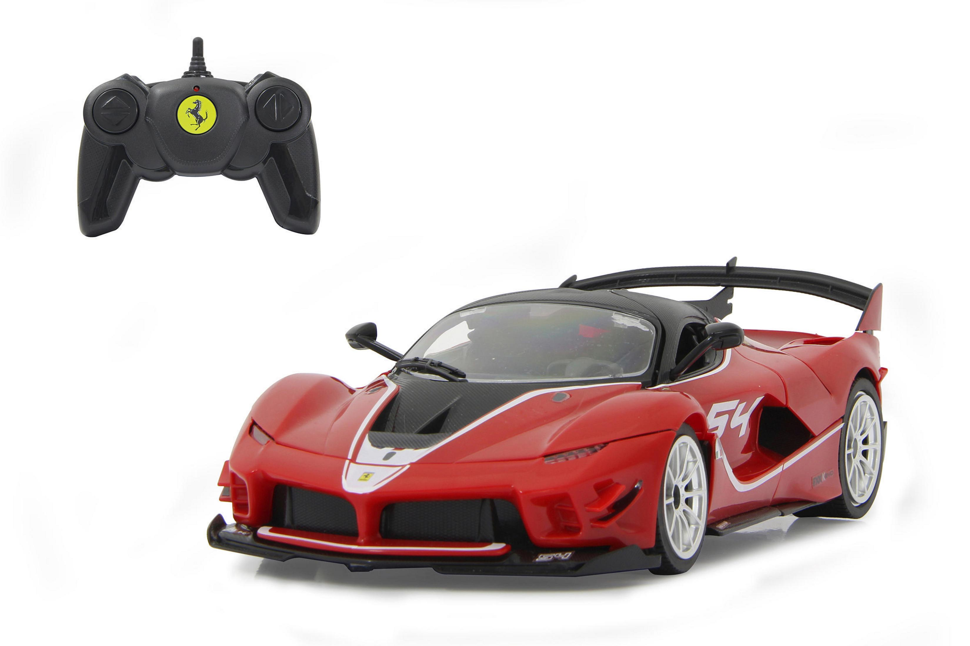 Ein rotes ferngesteuertes Auto mit einem schwarzen Controller im Hintergrund.