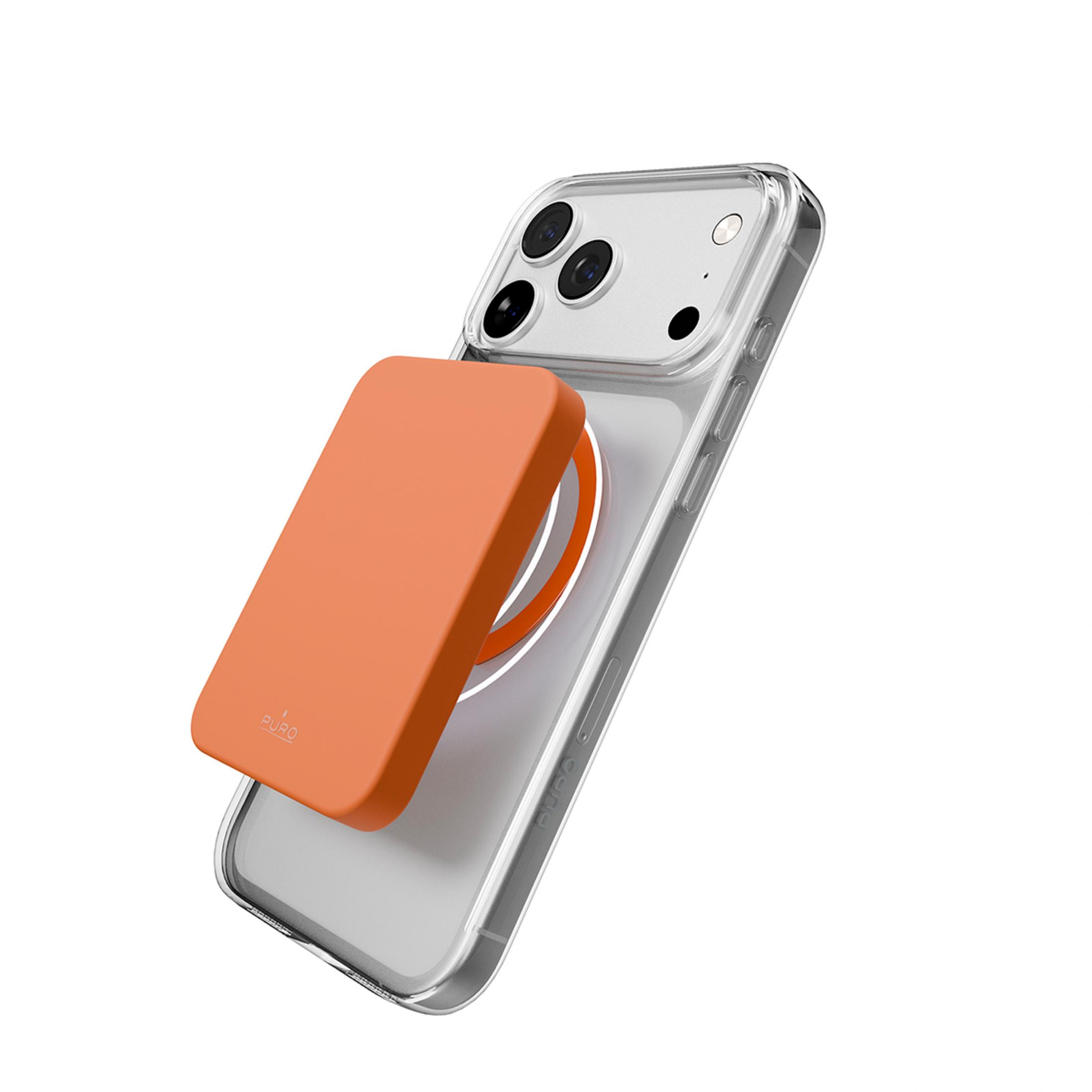 Pomarańczowa magnetyczna bateria z tyłu przezroczystego etui iPhone.