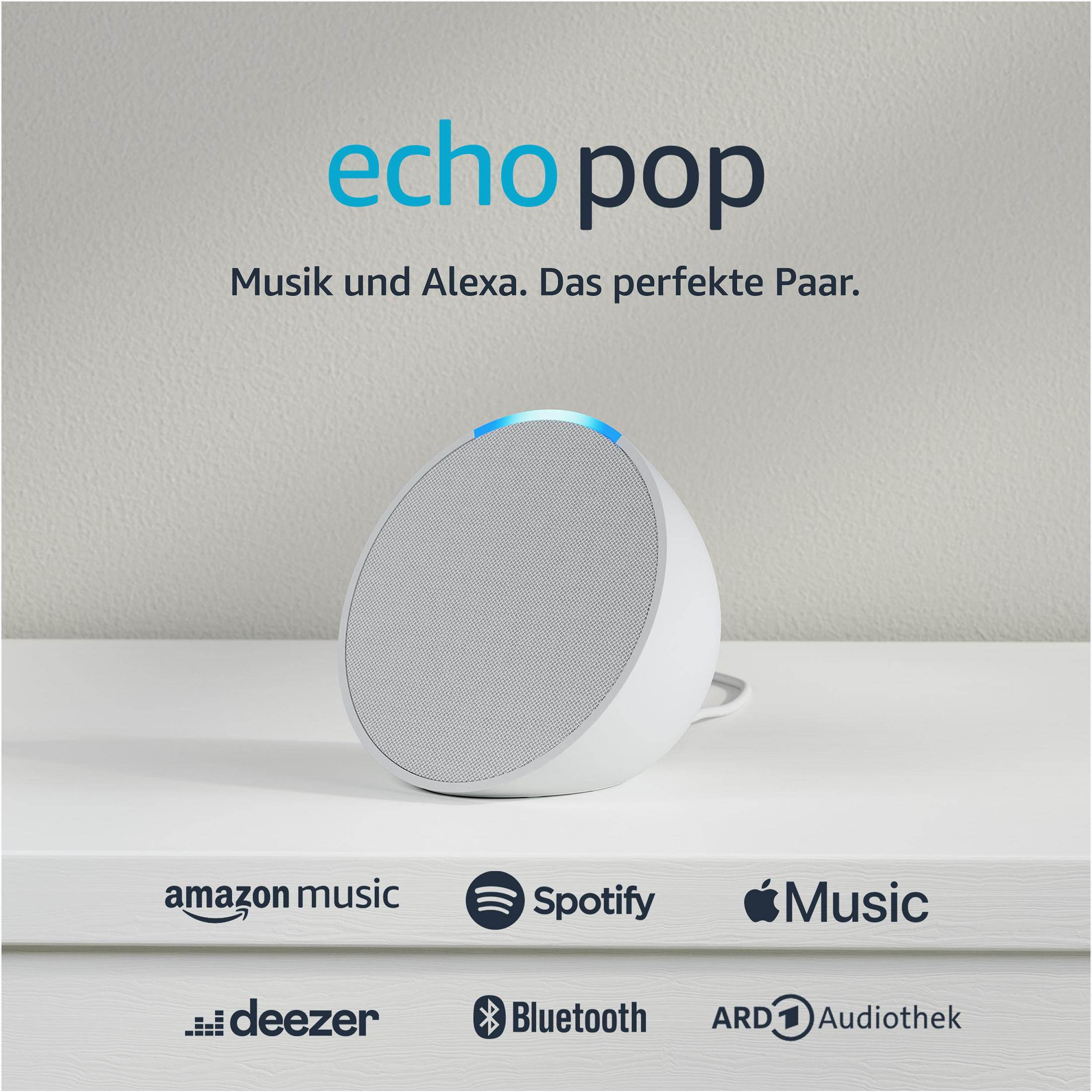 Un altoparlante Echo Pop bianco con luce blu, su uno scaffale.