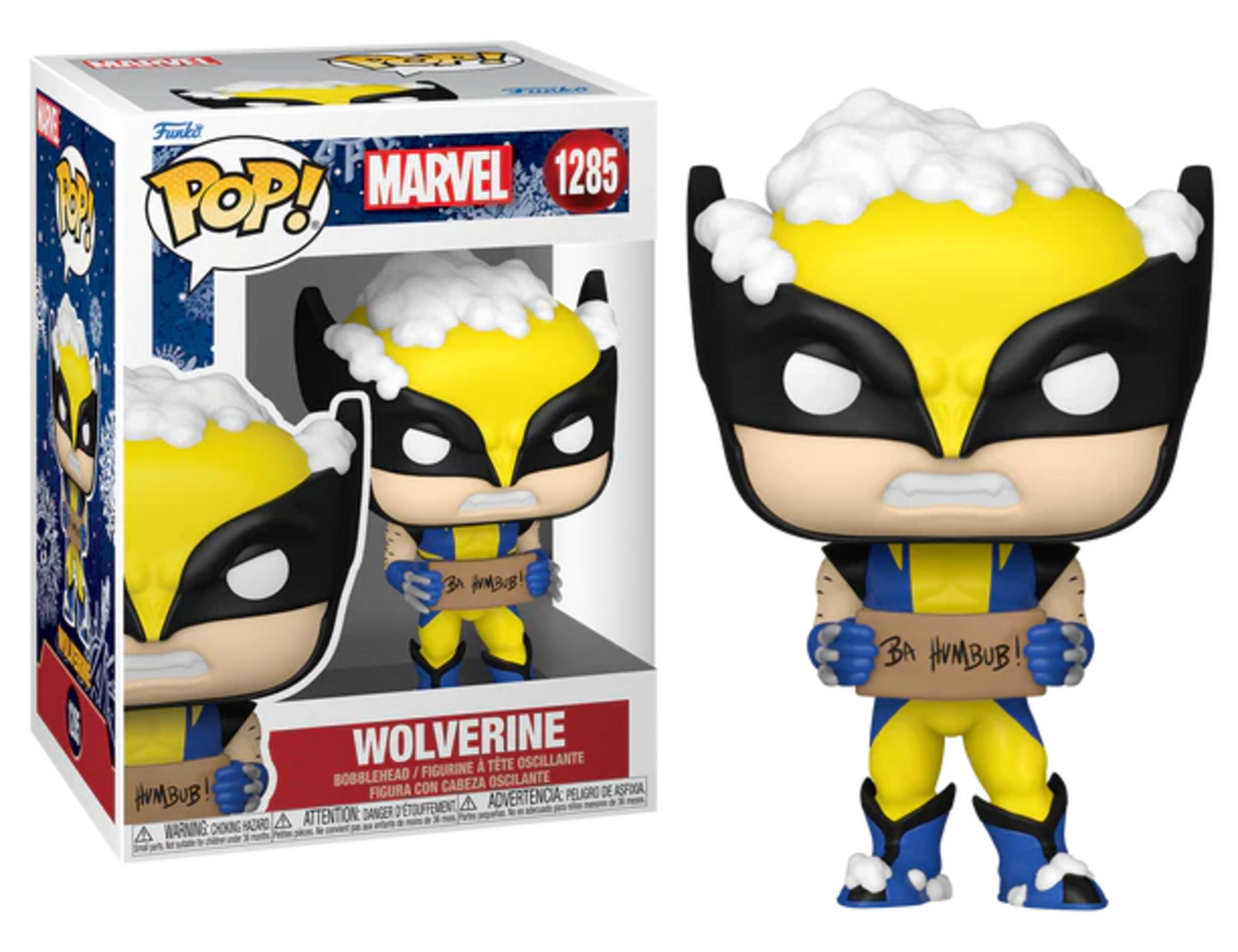 Figura Funko Pop de Wolverine sosteniendo un cartel de "BA HUMBUB!". Temática de nieve.