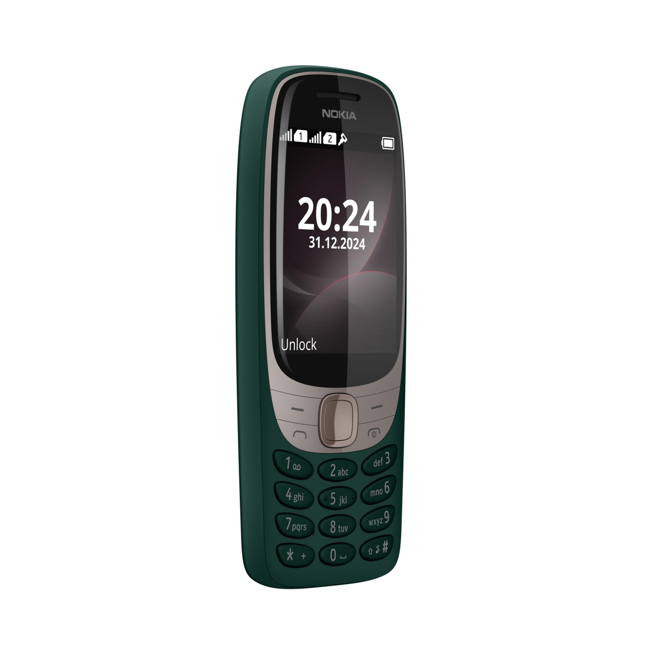 Telefono Nokia verde scuro con tastiera che mostra "Unlock" e l'ora.