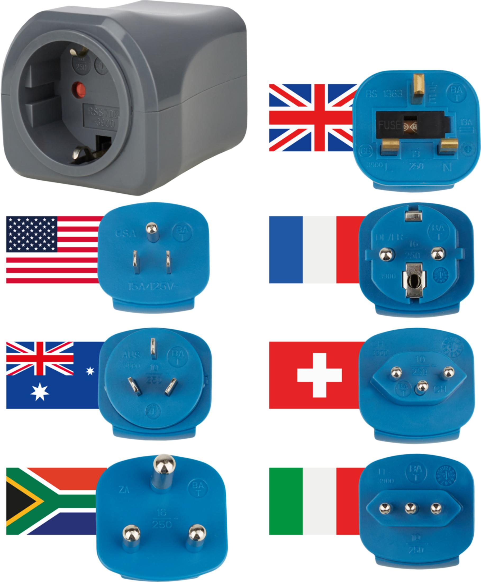 Adattatori da viaggio con vari tipi di spine e bandiere: GB, USA, Francia, Svizzera, Australia, Sud Africa, Italia.