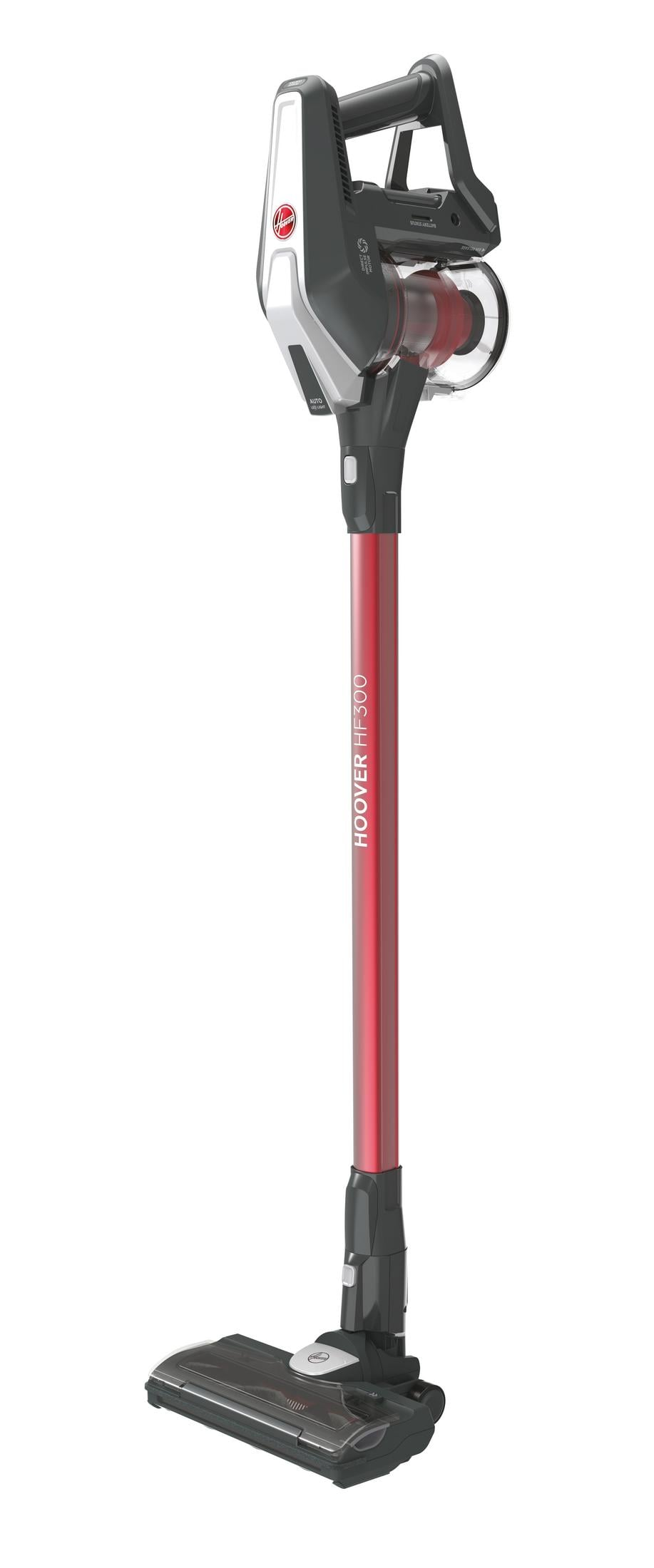 Un aspirapolvere a scopa Hoover rosso e grigio con raccoglipolvere rimovibile.