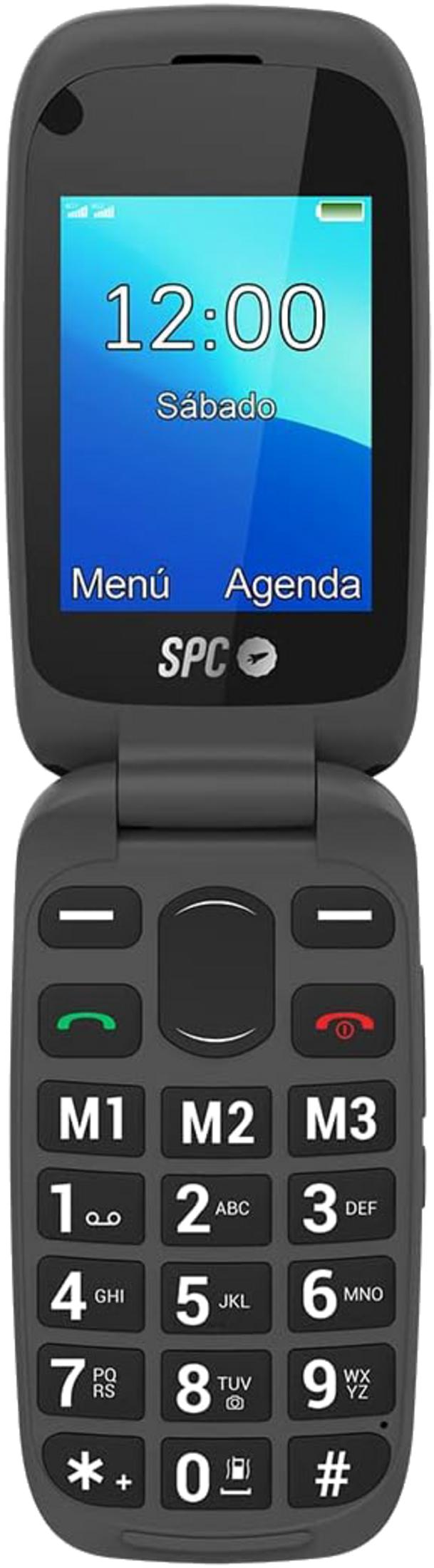 Un telefono flip grigio con schermo grande mostra le 12:00 e il menu.