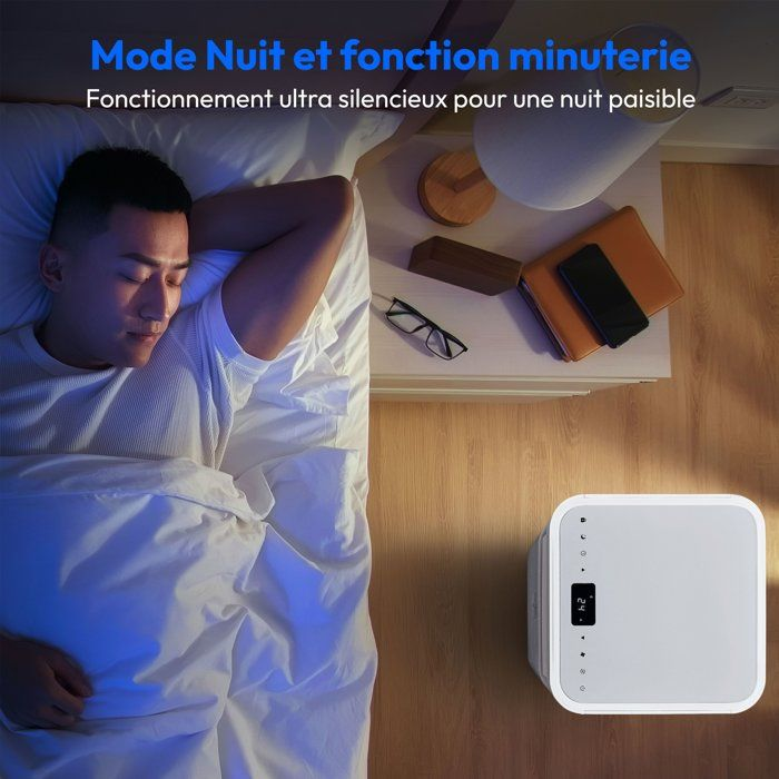 Mann schläft im Bett, Nachttisch mit Brille, Buch und Telefon, weiße Maschine daneben.