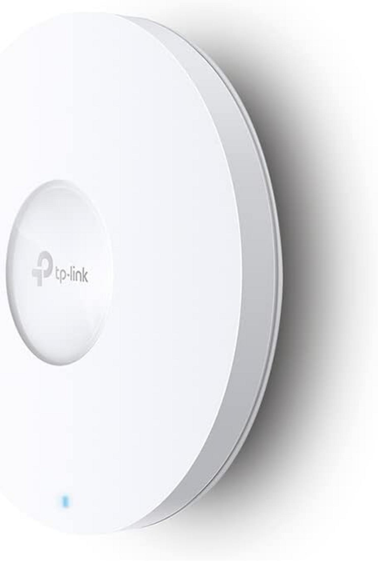 Ein weißes, rundes TP-Link-Gerät mit einem kleinen blauen Licht auf der Oberfläche.