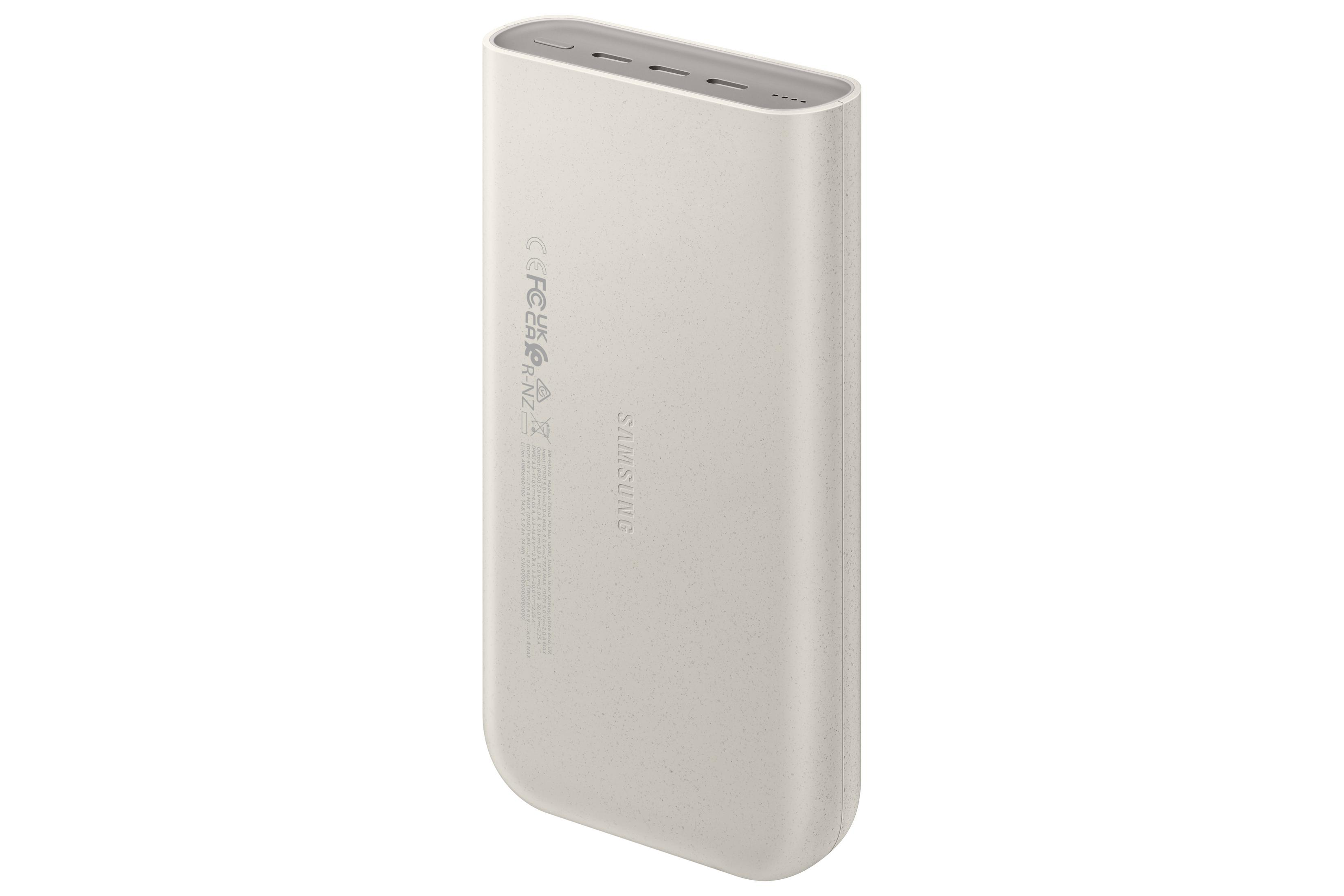 Şarj gösterge noktaları ve yazısı olan açık bej Samsung powerbank.