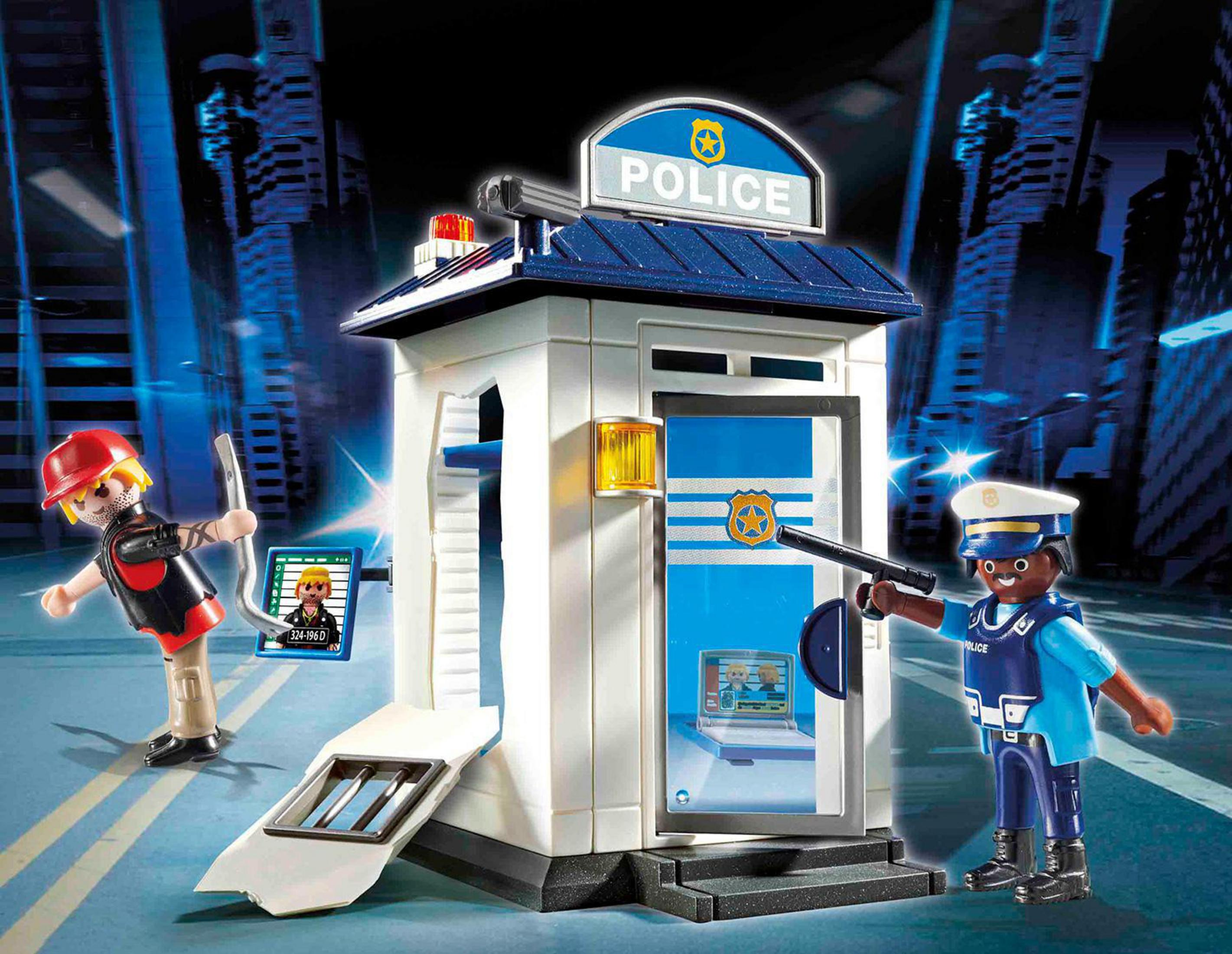 Estación de policía Playmobil con dos figuras y un prisionero.