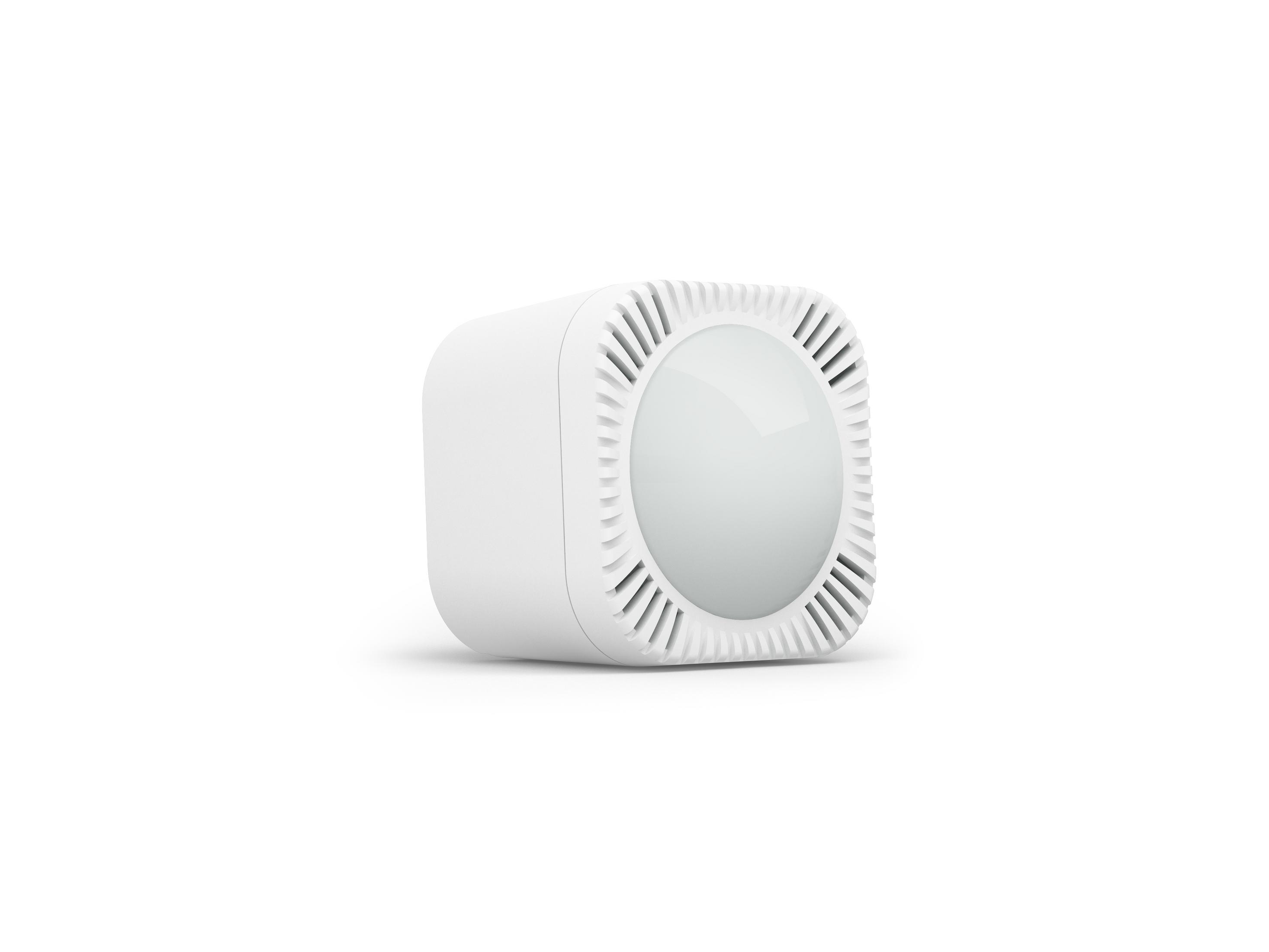 Altoparlante bianco a forma di cubo con lati scanalati e fronte rotondo smerigliato.