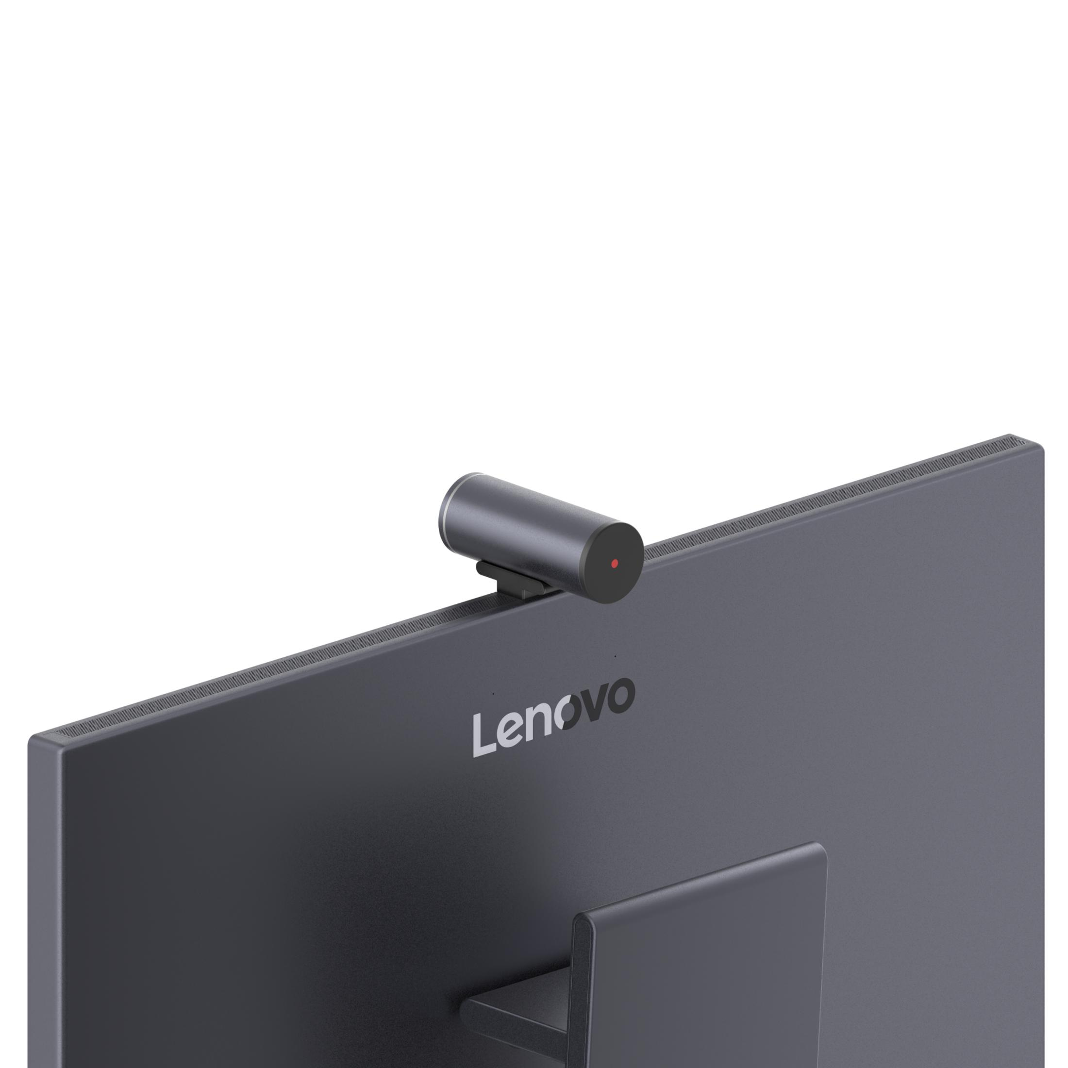 Eine graue Webcam mit rotem Licht sitzt auf einem Lenovo-Monitor.