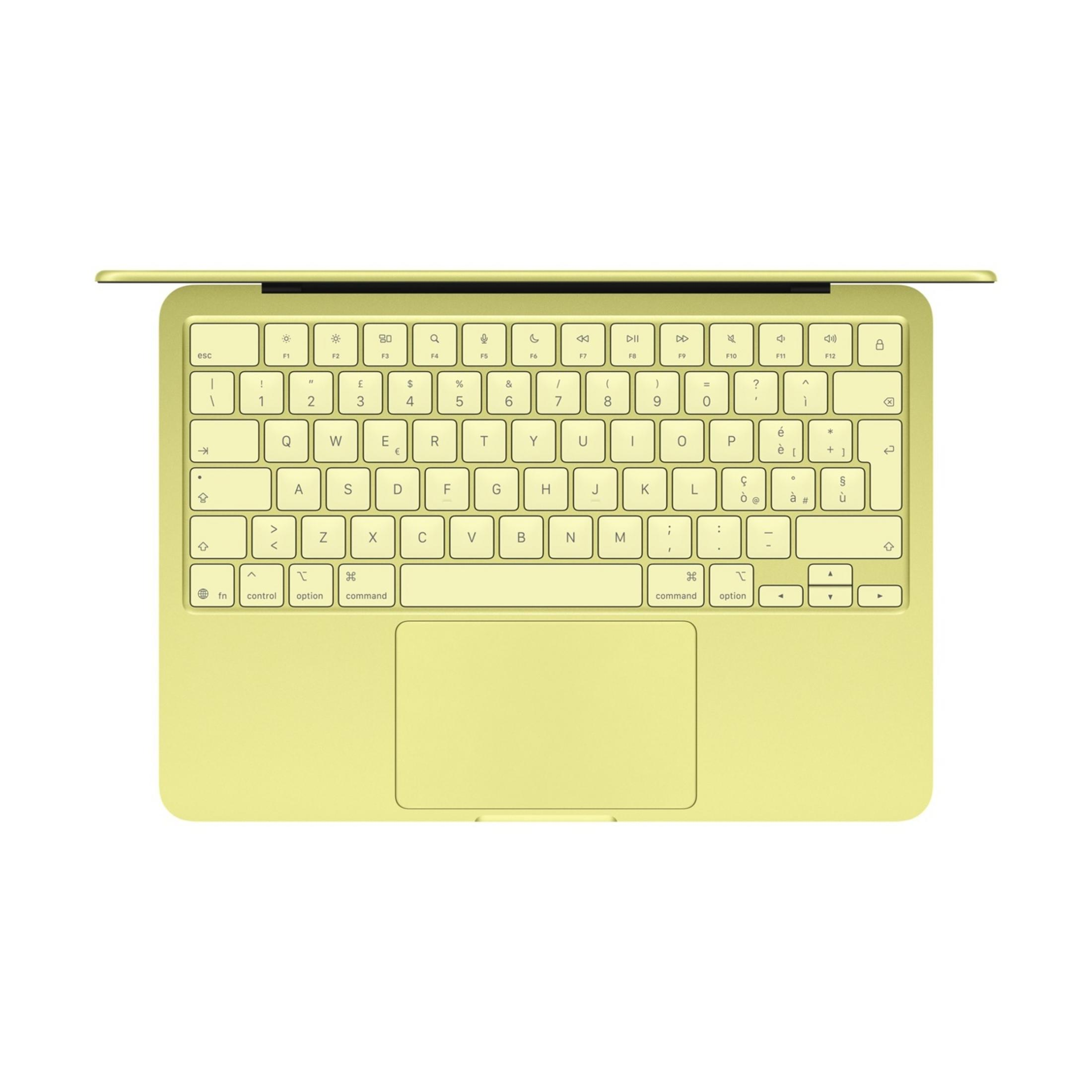 Tastiera e trackpad di un laptop giallo visti dall'alto.