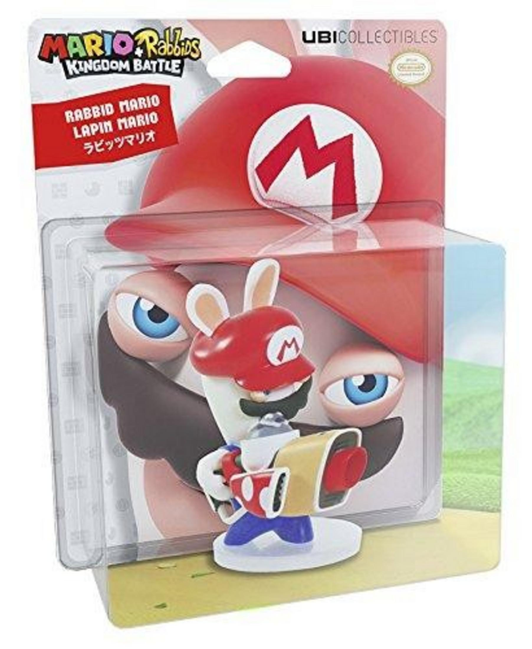 Ein Rabbid Mario Spielzeug in Verpackung, mit roter Mütze und Waffe.