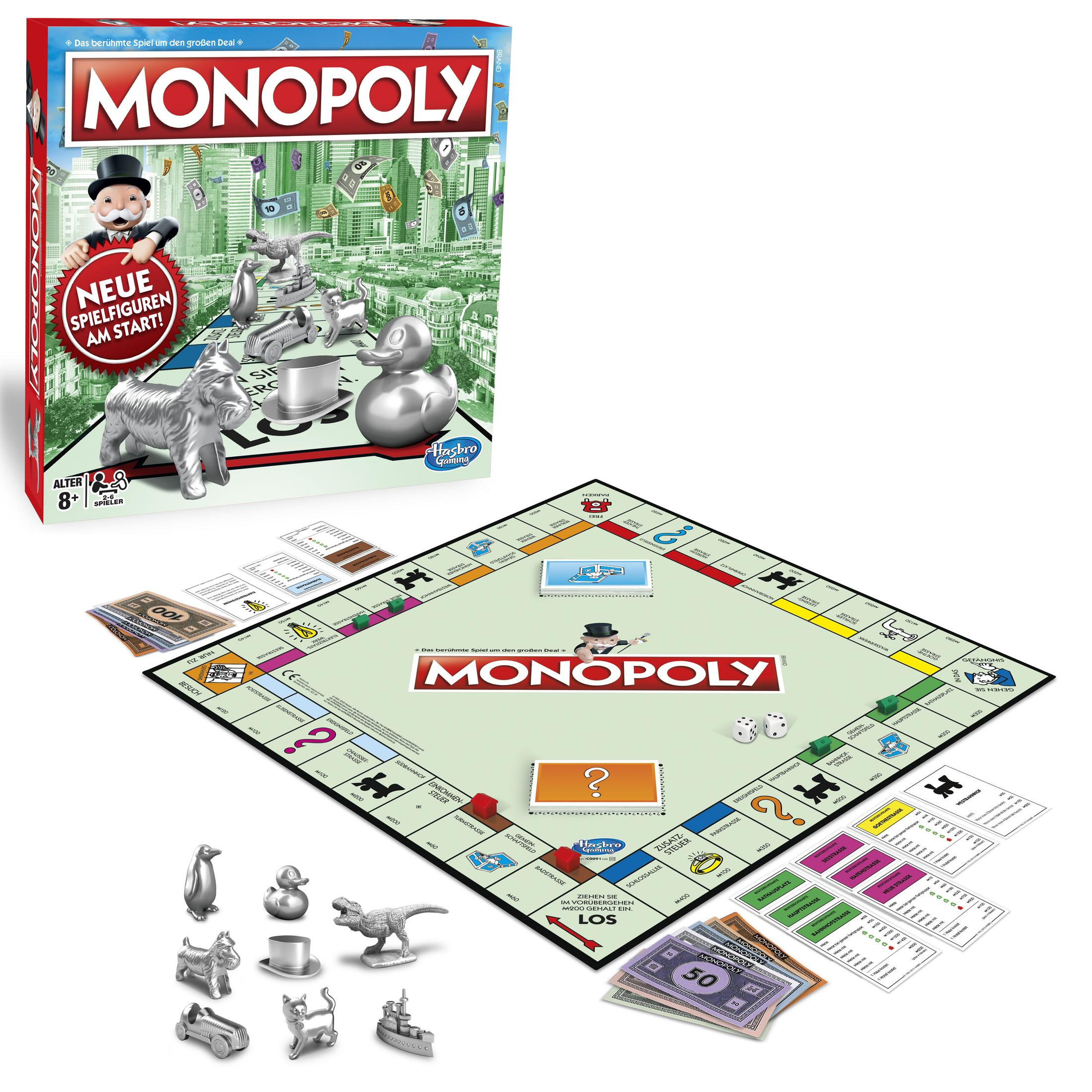 Monopoly-Spielbrett mit Figuren, Geld und Spielkarten. Monopoly-Schachtel im Hintergrund.