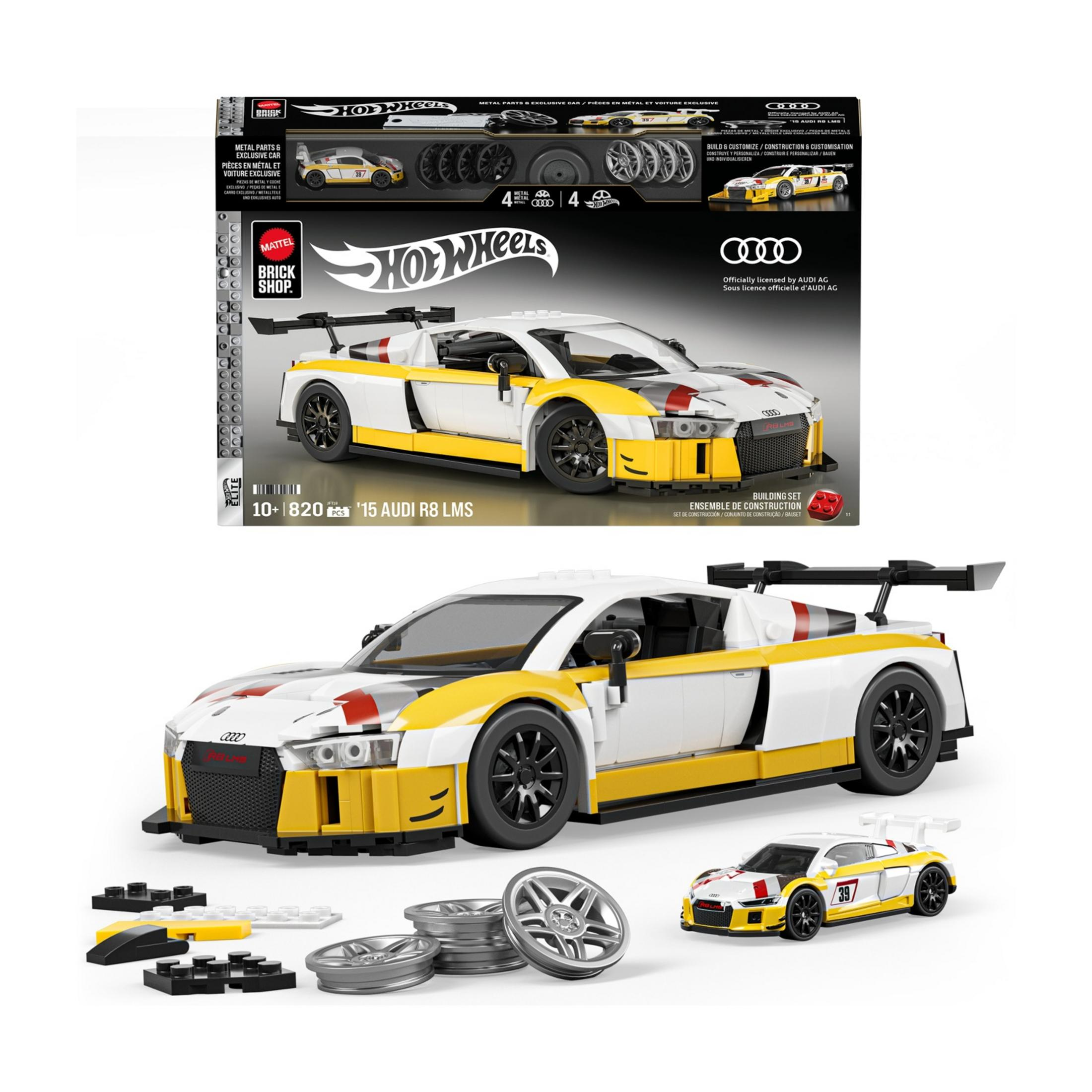 Set di costruzione di un'Audi R8 LMS bianca e gialla con accenti rossi, parti sfuse incluse.