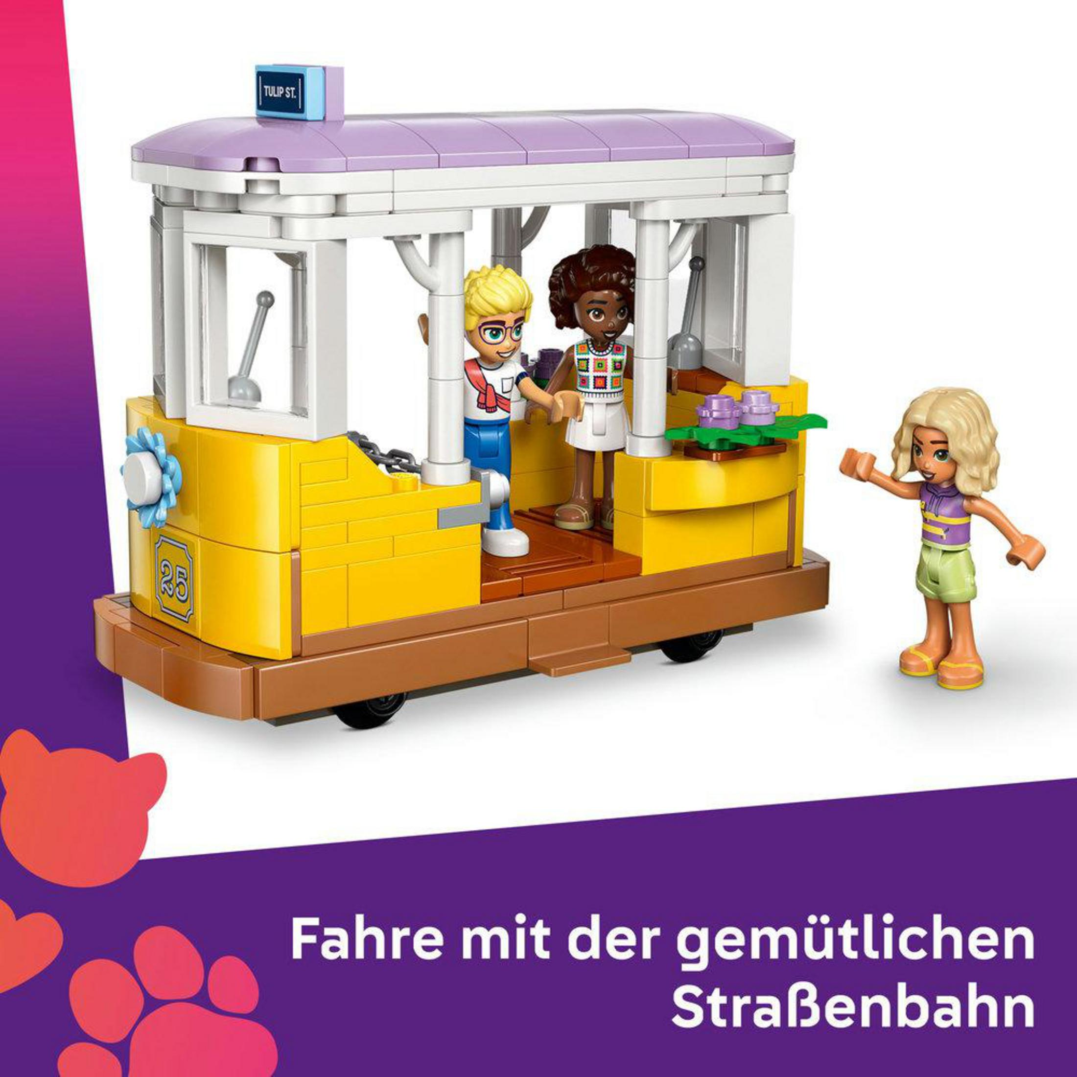Kolorowy tramwaj Lego z figurkami i znakiem "Tulip St."