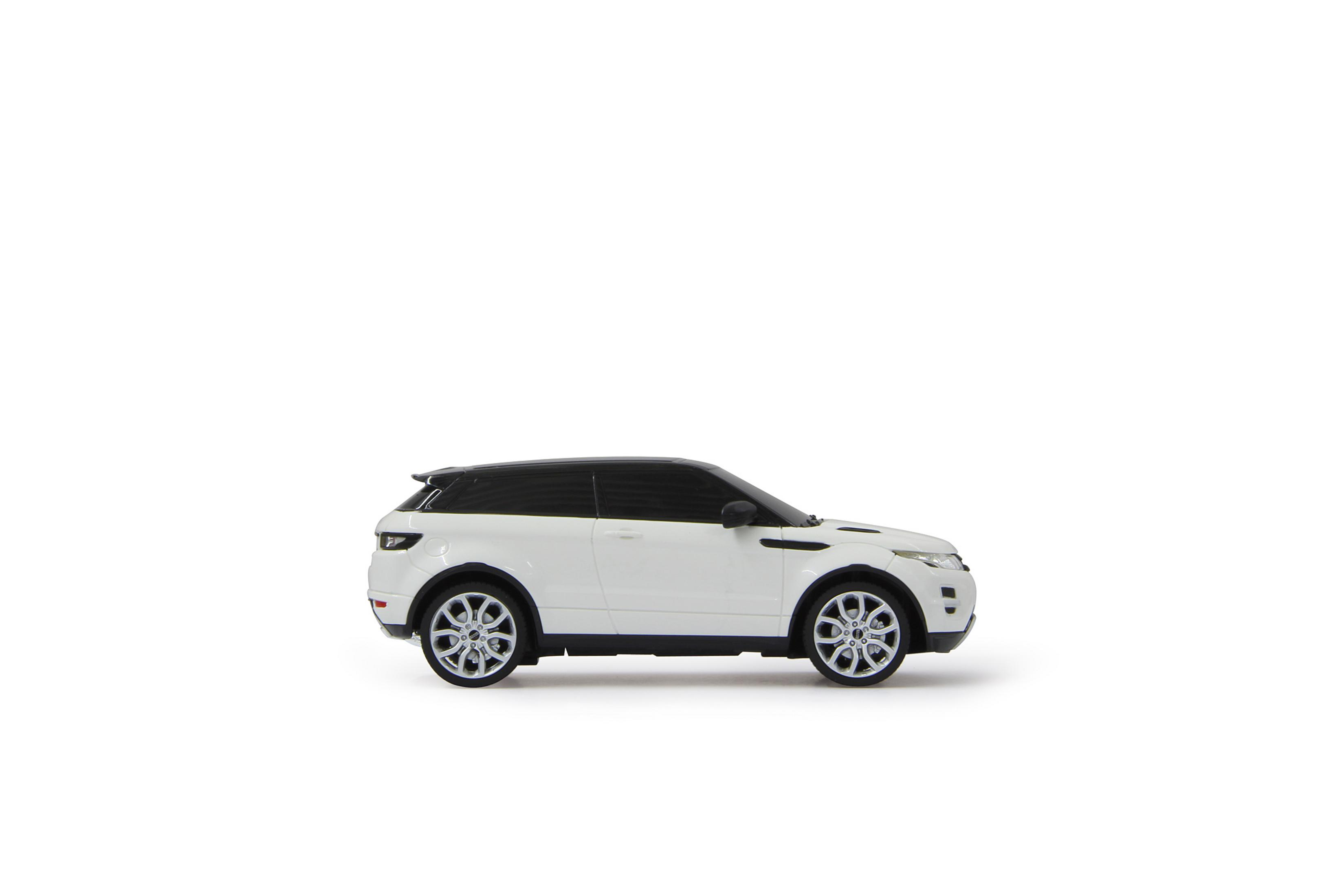 Ein weißes SUV-Spielzeugauto mit schwarzen Fenstern und Felgen auf weißem Grund.