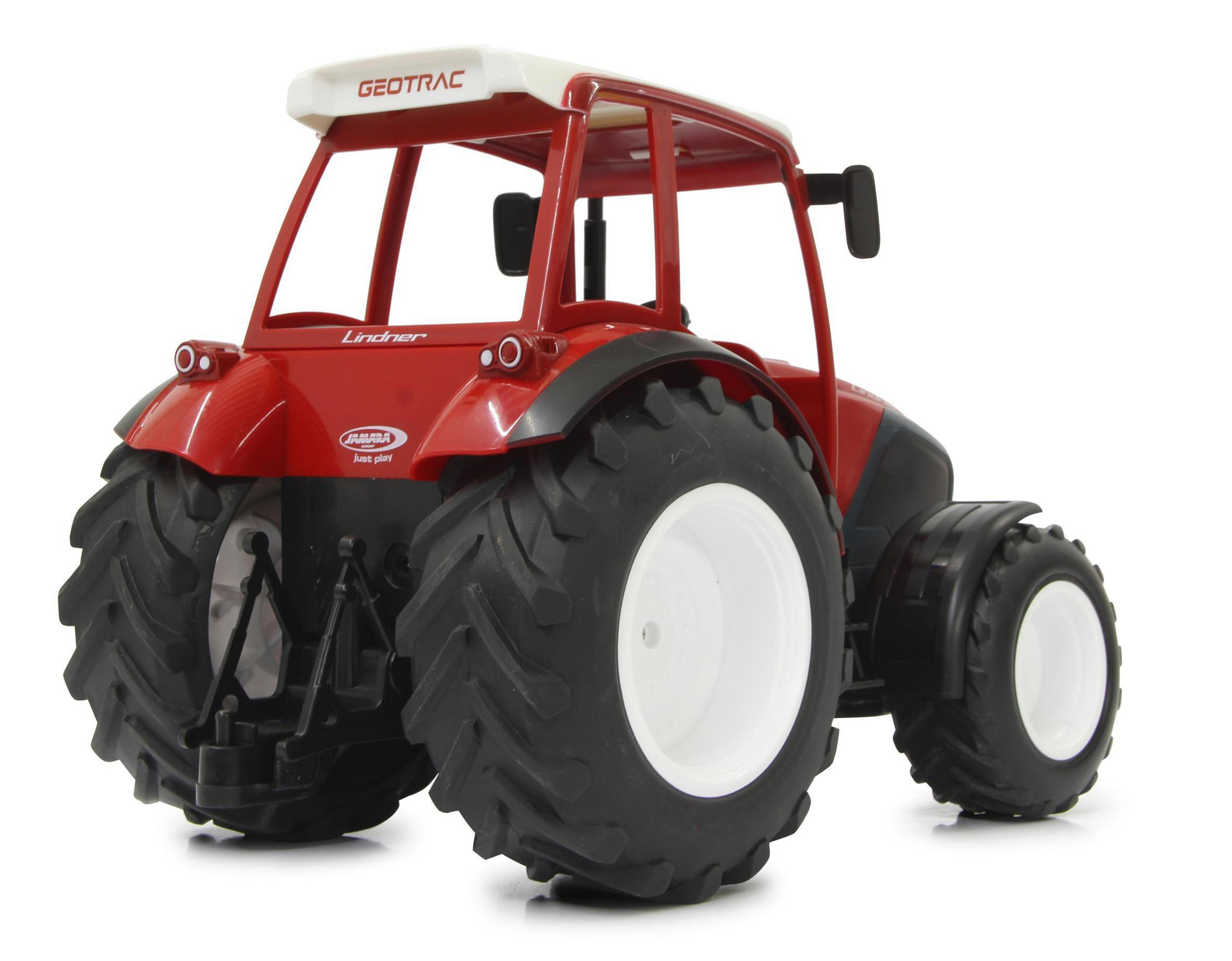 Ein roter Spielzeugtraktor mit groben Reifen, weißen Felgen und einem weißen Dach.