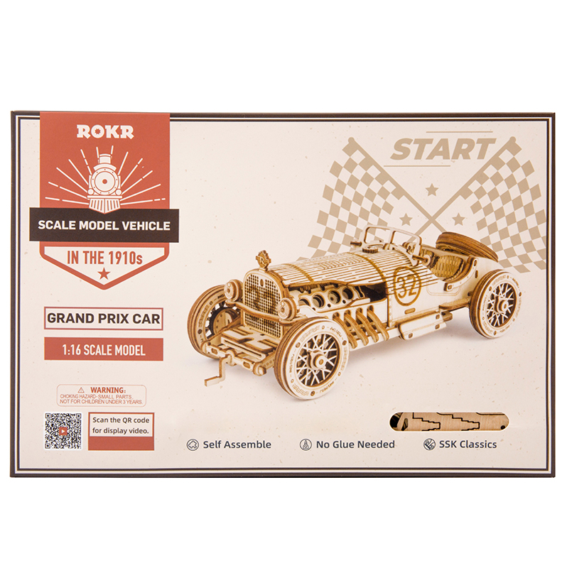 ROKR Grand Prix Auto Modellbausatz-Schachtel mit Holzauto, karierten Flaggen und Text.