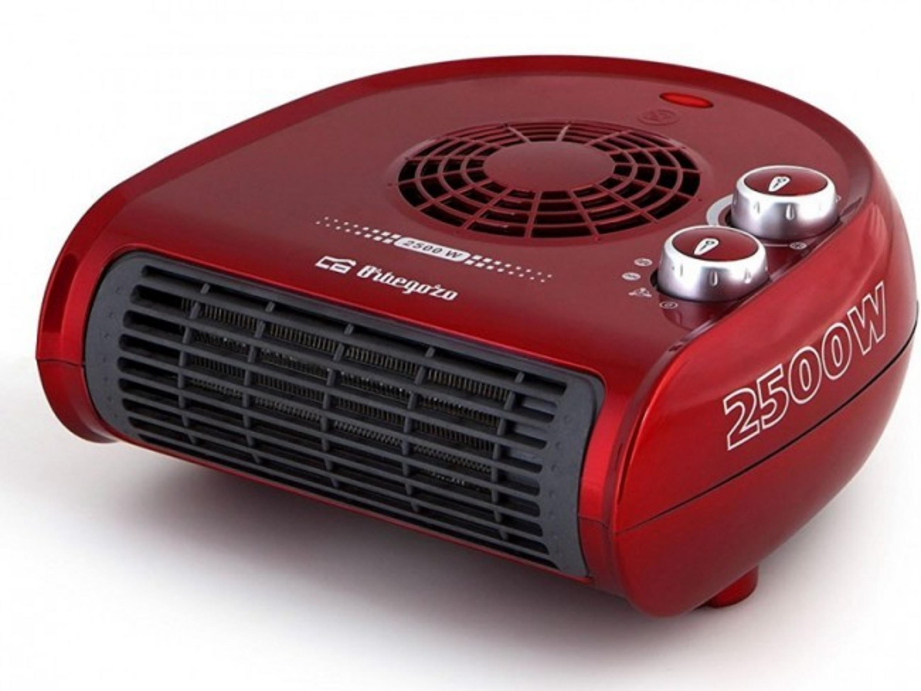 Un riscaldatore rosso con griglia di ventilazione e due manopole.