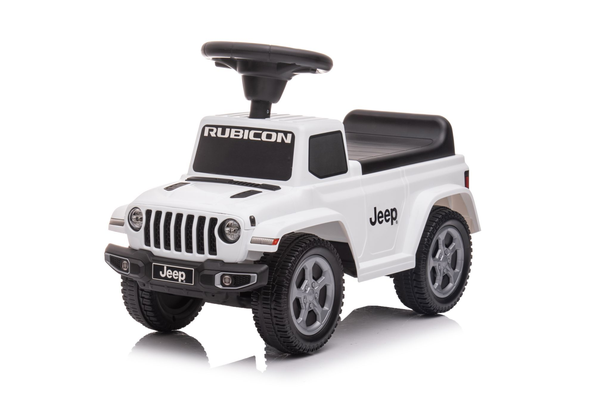 Biały samochód Jeep dla dzieci z czarną kierownicą i napisem "Rubicon".