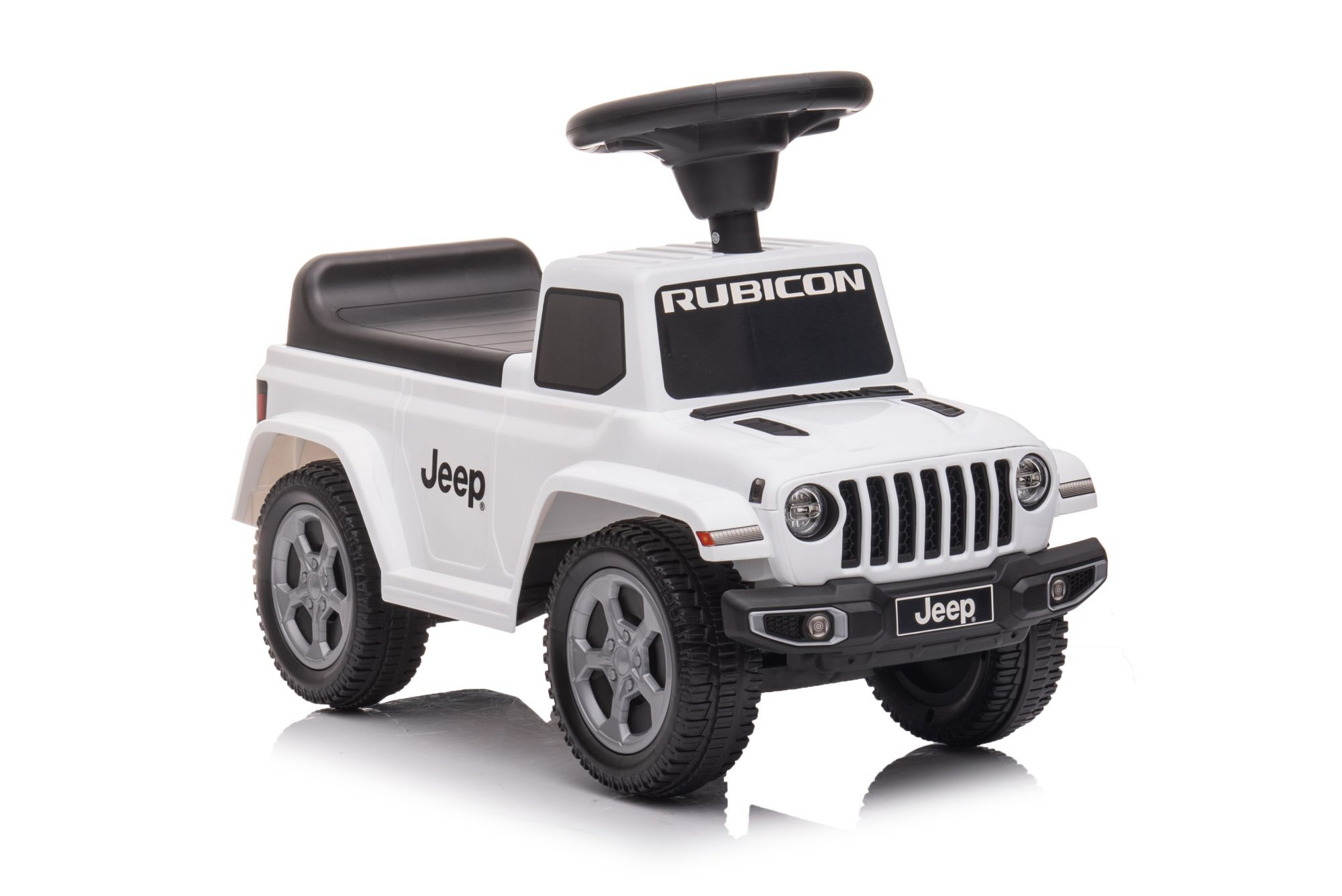 Biały Jeep zabawkowa z czarną kierownicą i napisem "Rubicon".