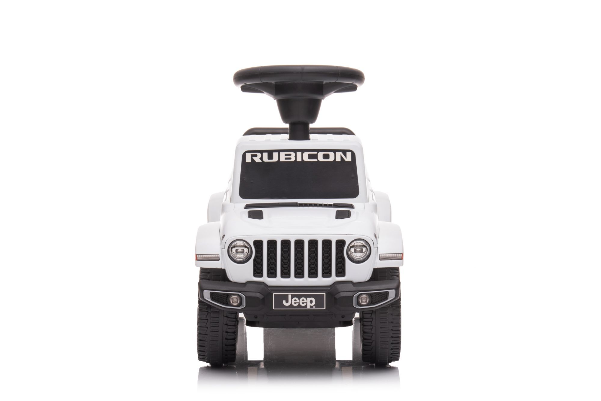 Biały dziecięcy Jeep Rubicon zabawka z czarną kierownicą i napisem RUBICON.