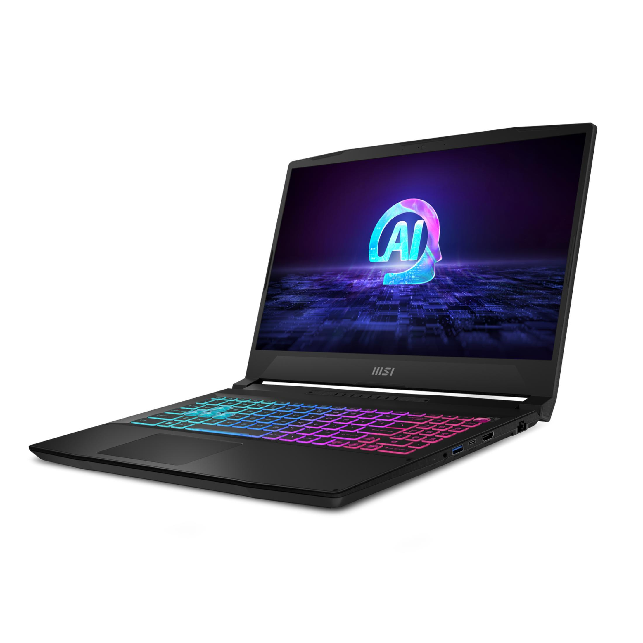 Portátil negro con teclado iluminado y logo de IA en pantalla.